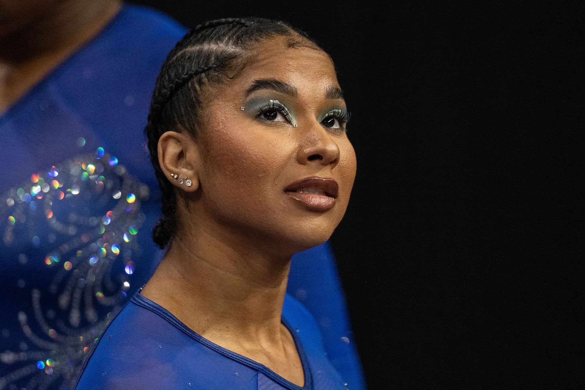 Jordan Chiles looks on at the UCLA v Washington meet - (Source: Getty)