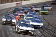 Denny Hamlin, driver of the #11 FedEx Toyota, leads the field during the NASCAR Cup Series Ambetter Health 400 at Atlanta Motor Speedway - Source: Getty