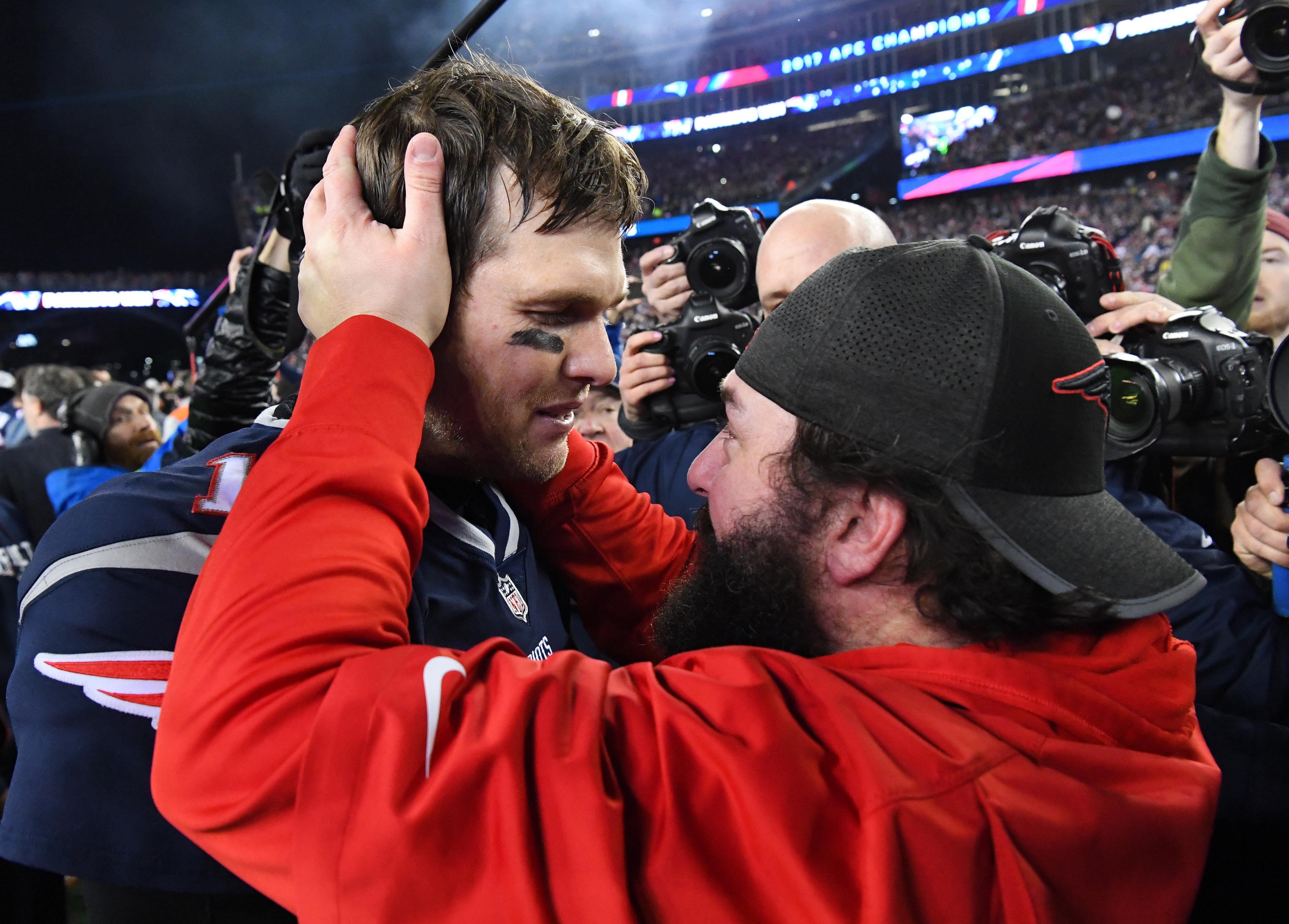 Tom Brady (12) greets defensive coordinator Matt Patricia - Source: Imagn