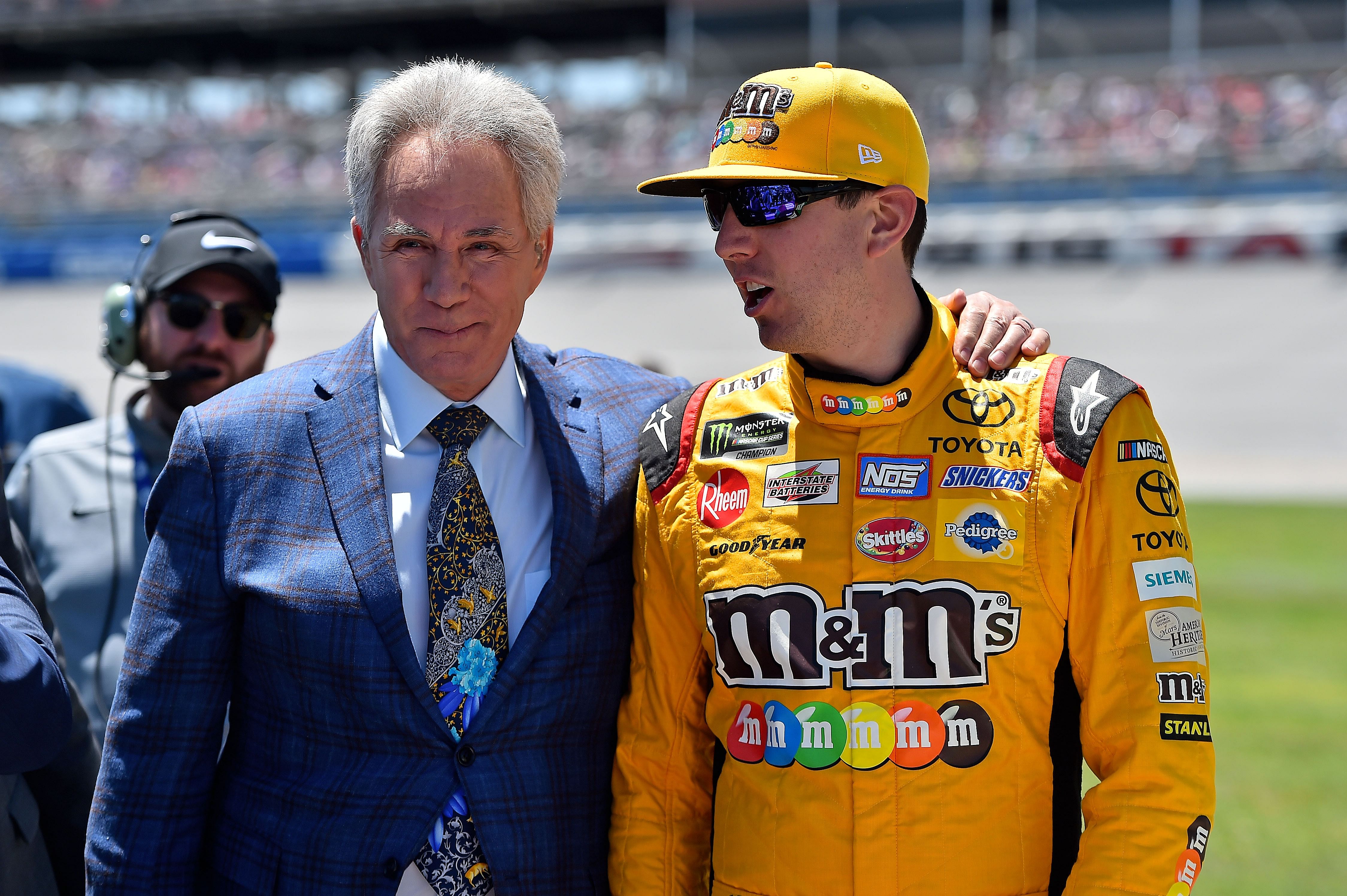 FOX Sports broadcaster and former driver Darrell Waltrip talks with NASCAR Cup Series driver Kyle Busch (18) prior to the GEICO 500 at Talladega Superspeedway. - Source: Imagn