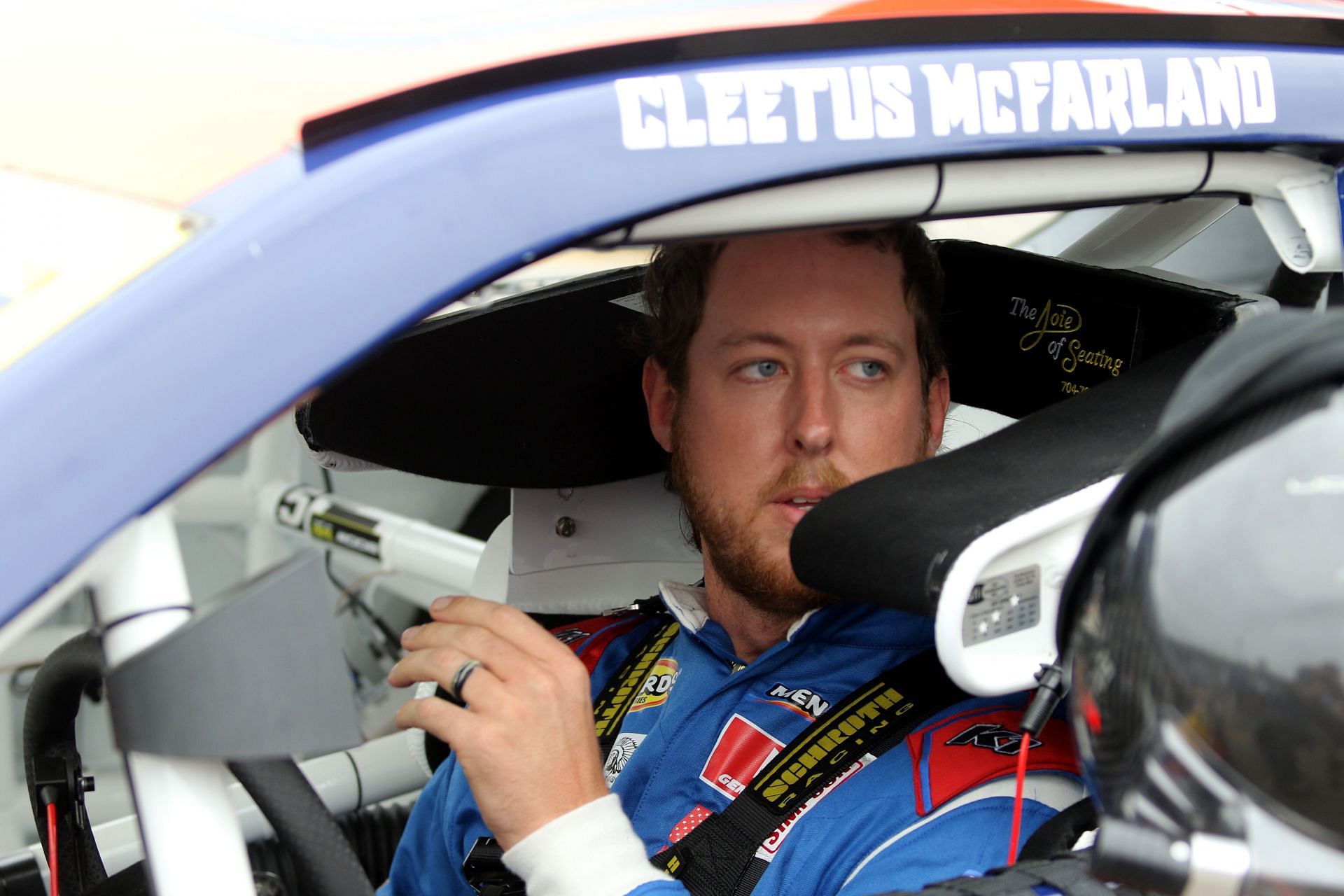 Cleetus McFarland sits in his car waiting for practice for the ARCA Menards Series Chilli&#039;s Ride the Dente 200 - Source: Getty