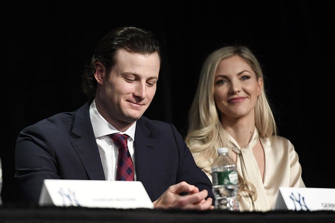 Gerrit Cole's wife Amy turns up the glamor in a peach frilly dress on a scenic double date with Yankees ace