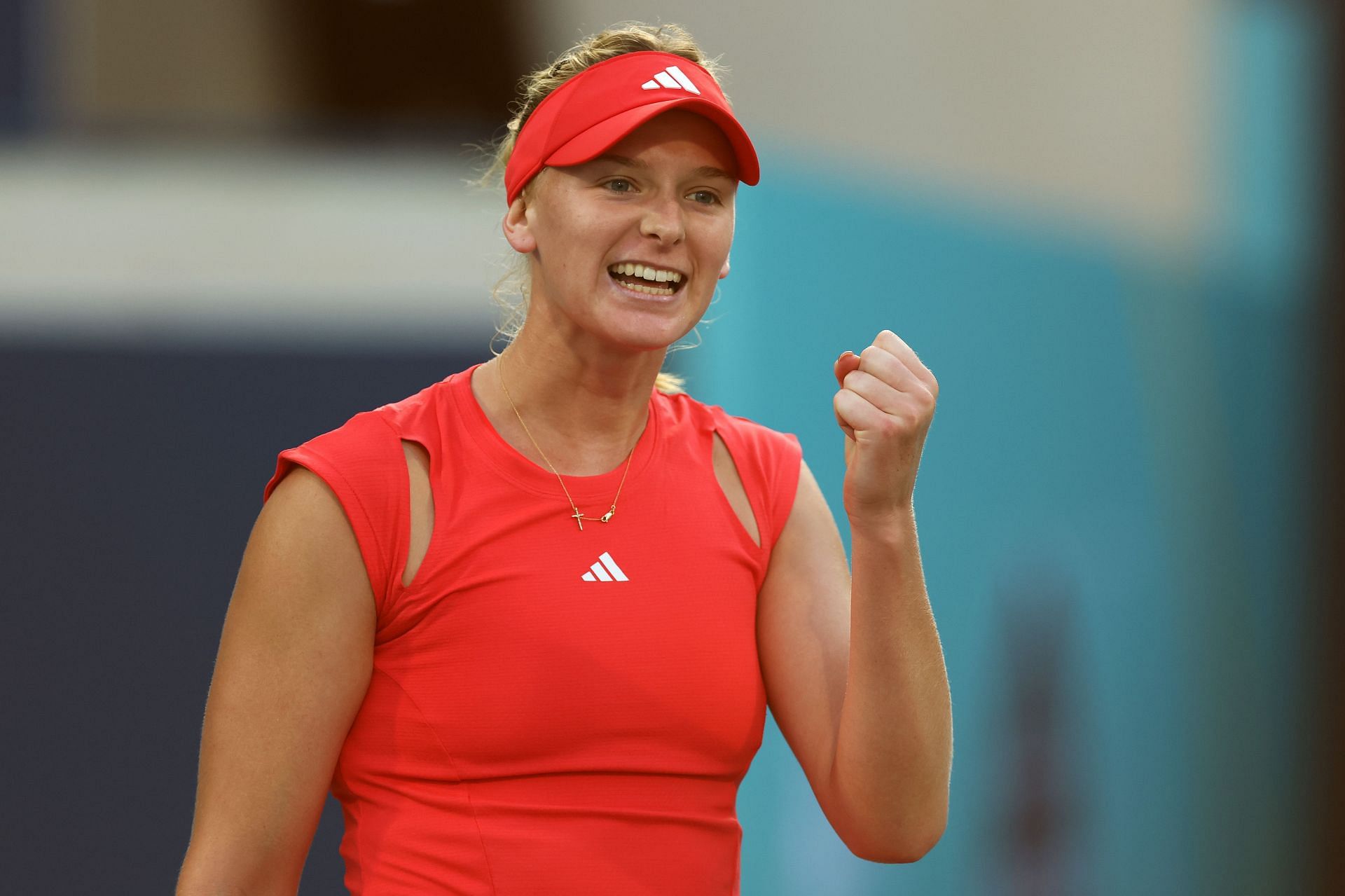 Ashlyn Krueger celebrates victory over Mccartney Kessler during their match on day two of the Mubadala Abu Dhabi Open - Source: Getty