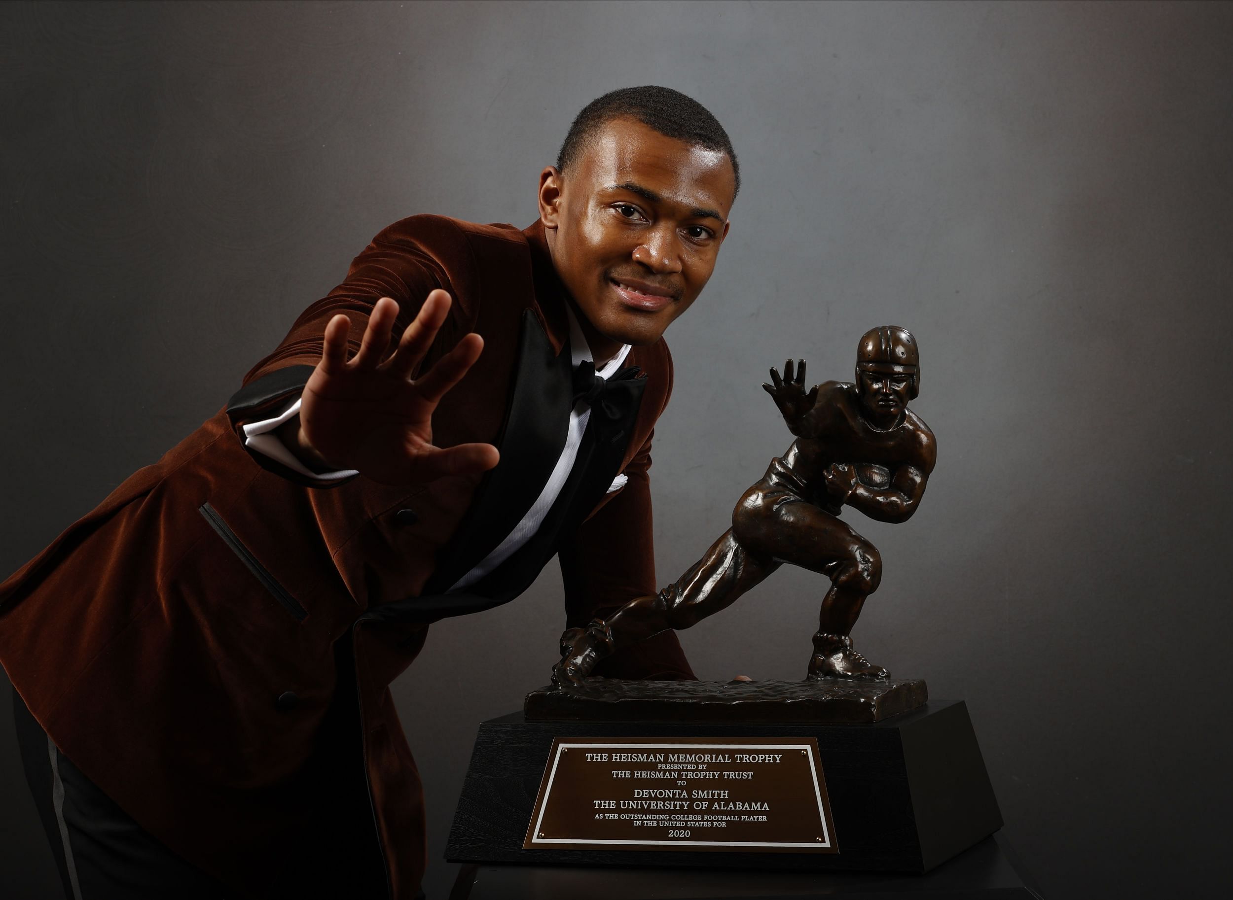 Jan 5, 2021; Tuscaloosa, AL, USA; Alabama Crimson Tide wide receiver DeVonta Smith poses for a photo after being announced the winner of the 2020 Heisman Trophy. (Credit: Kent Gidley/Heisman Trophy Trust via Imagn Images)