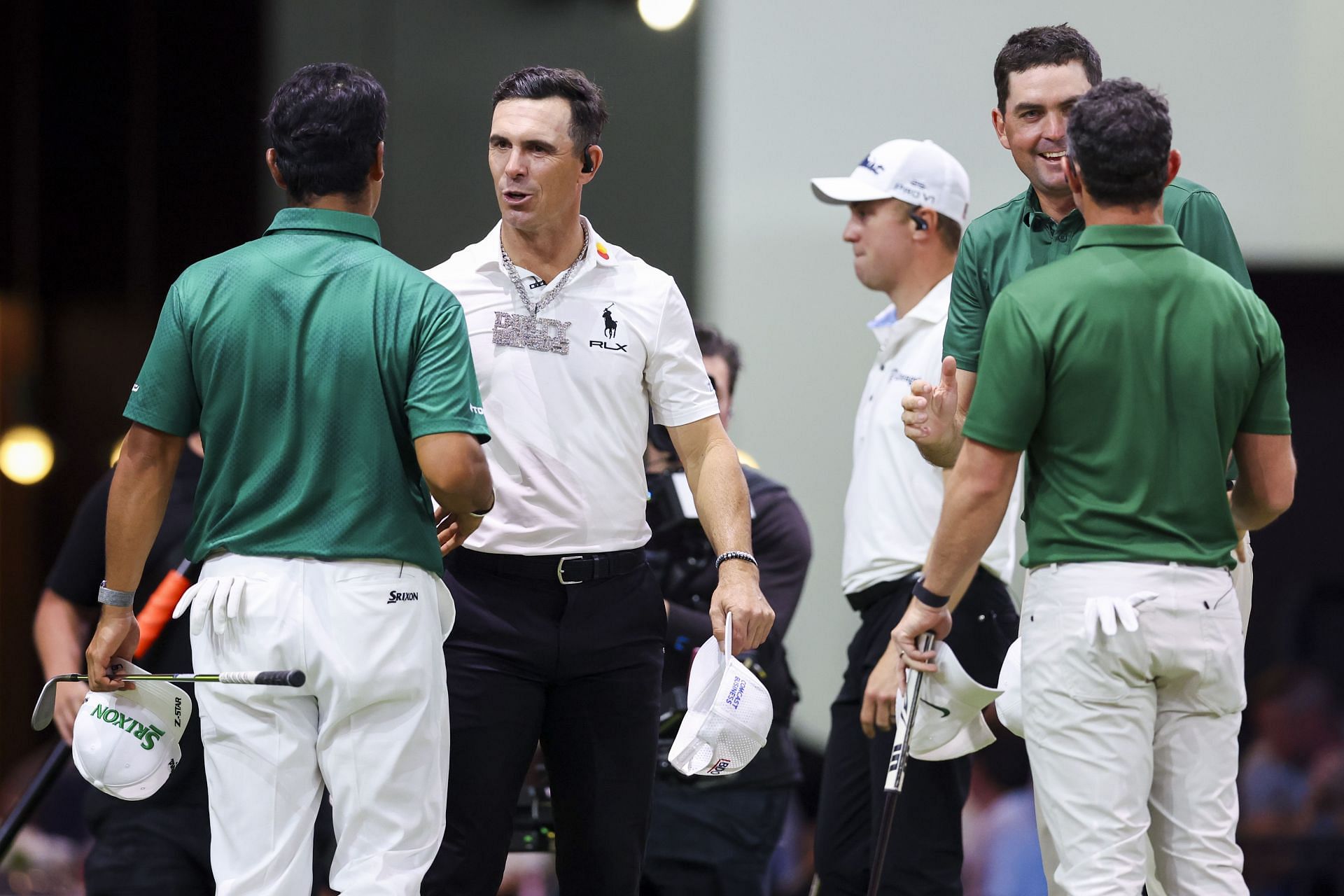 Billy Horschel speaks with Hideki Matsuyama at recent TGL event (via Getty)