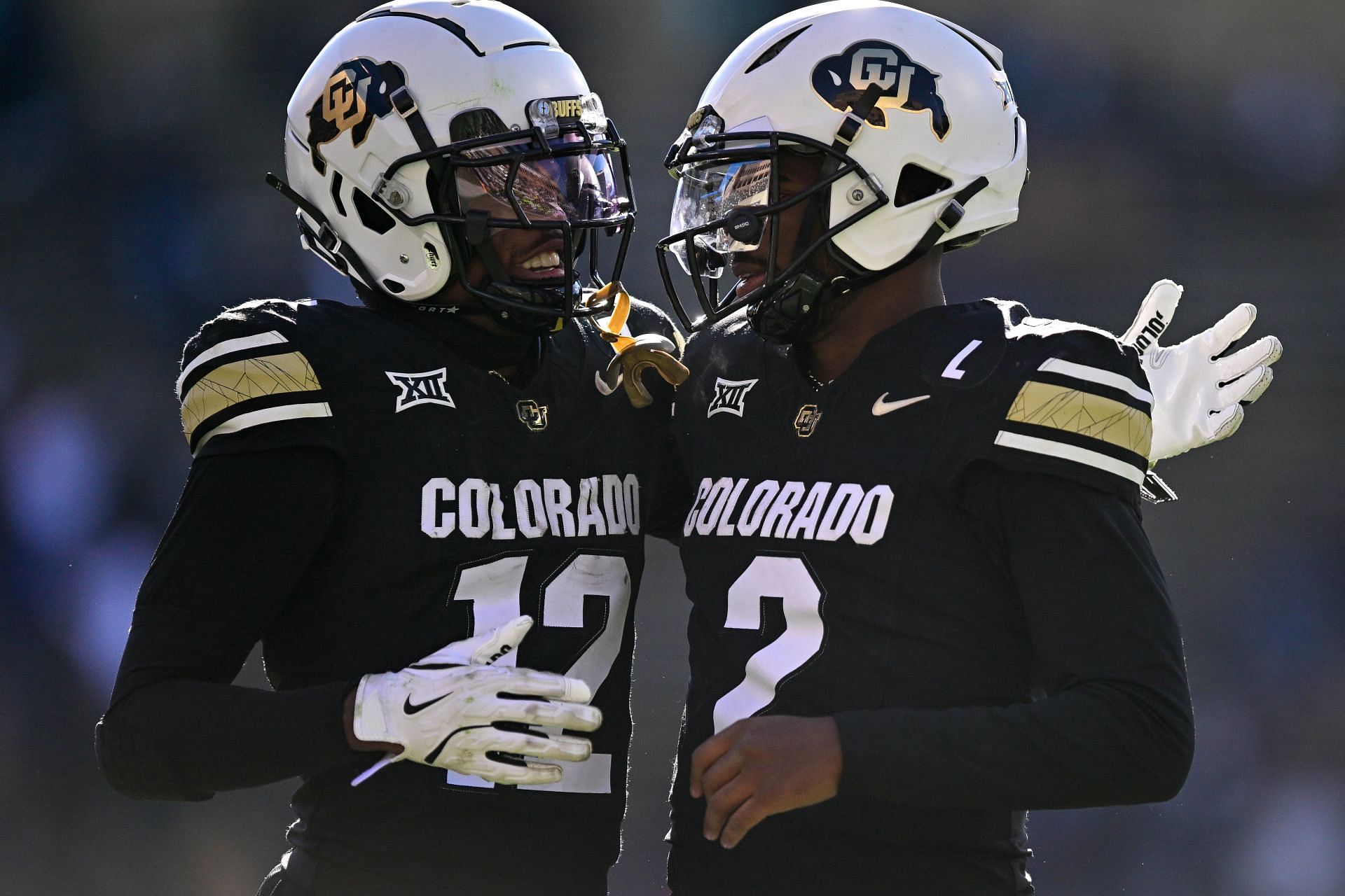 Travis Hunter, left, Shedeur Sanders, right, during Oklahoma State v Colorado - Source: Getty