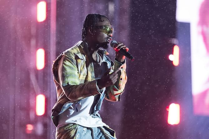Why was Lil Tjay escorted out of Madison Square Garden? Viral footage of rapper spitting on a guard explored