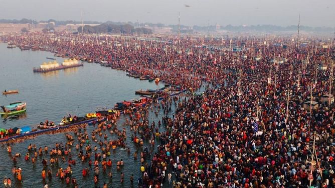 Indian legend takes holy dip with wife at Maha Kumbh 2025 [In Pictures]