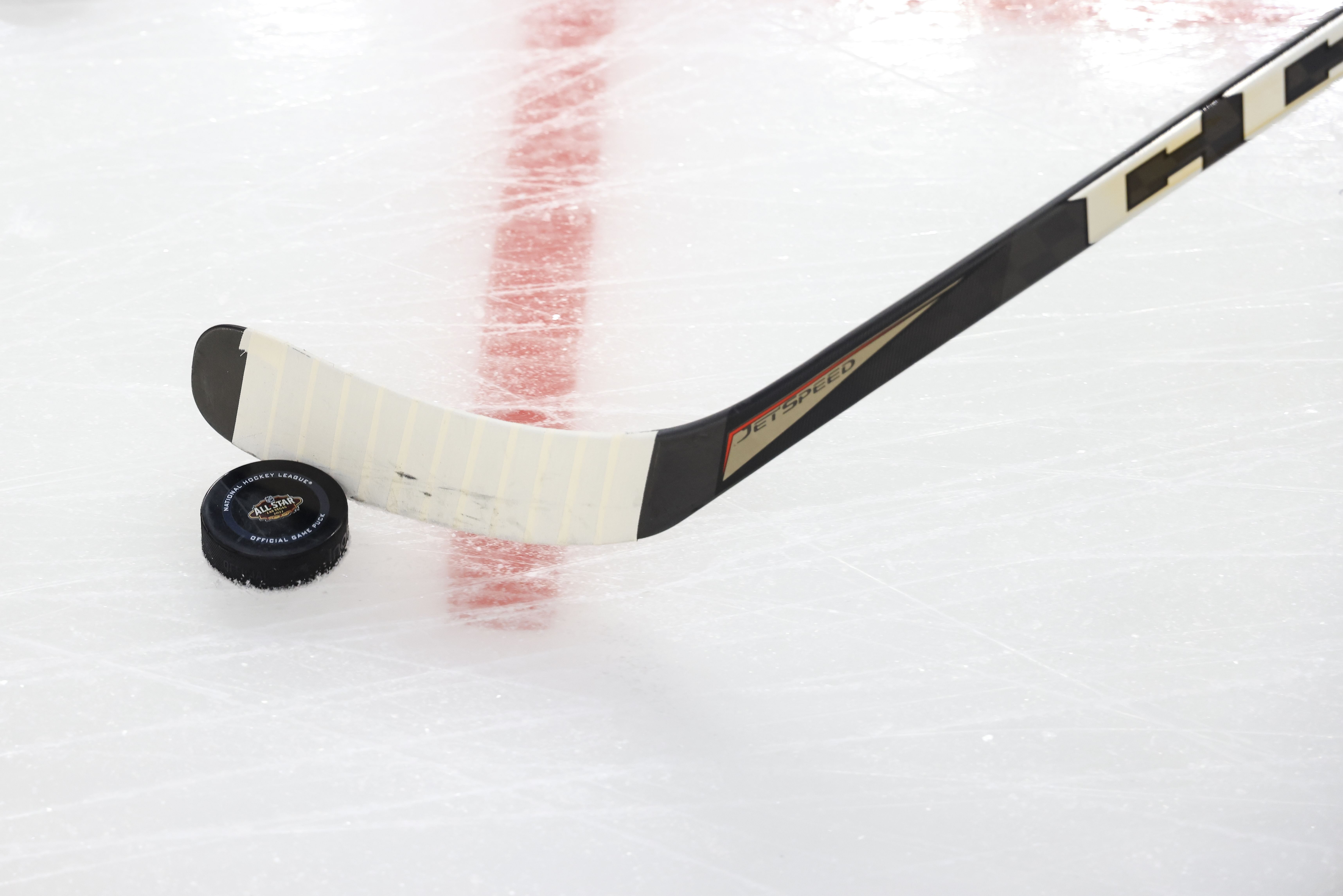 Feb 5, 2022; Las Vegas, Nevada, USA; A view of the All-Star logo on a game puck during warm ups prior to the 2022 NHL All-Star Game at T-Mobile Arena. Mandatory Credit: Aaron Doster-Imagn Images - Source: Imagn