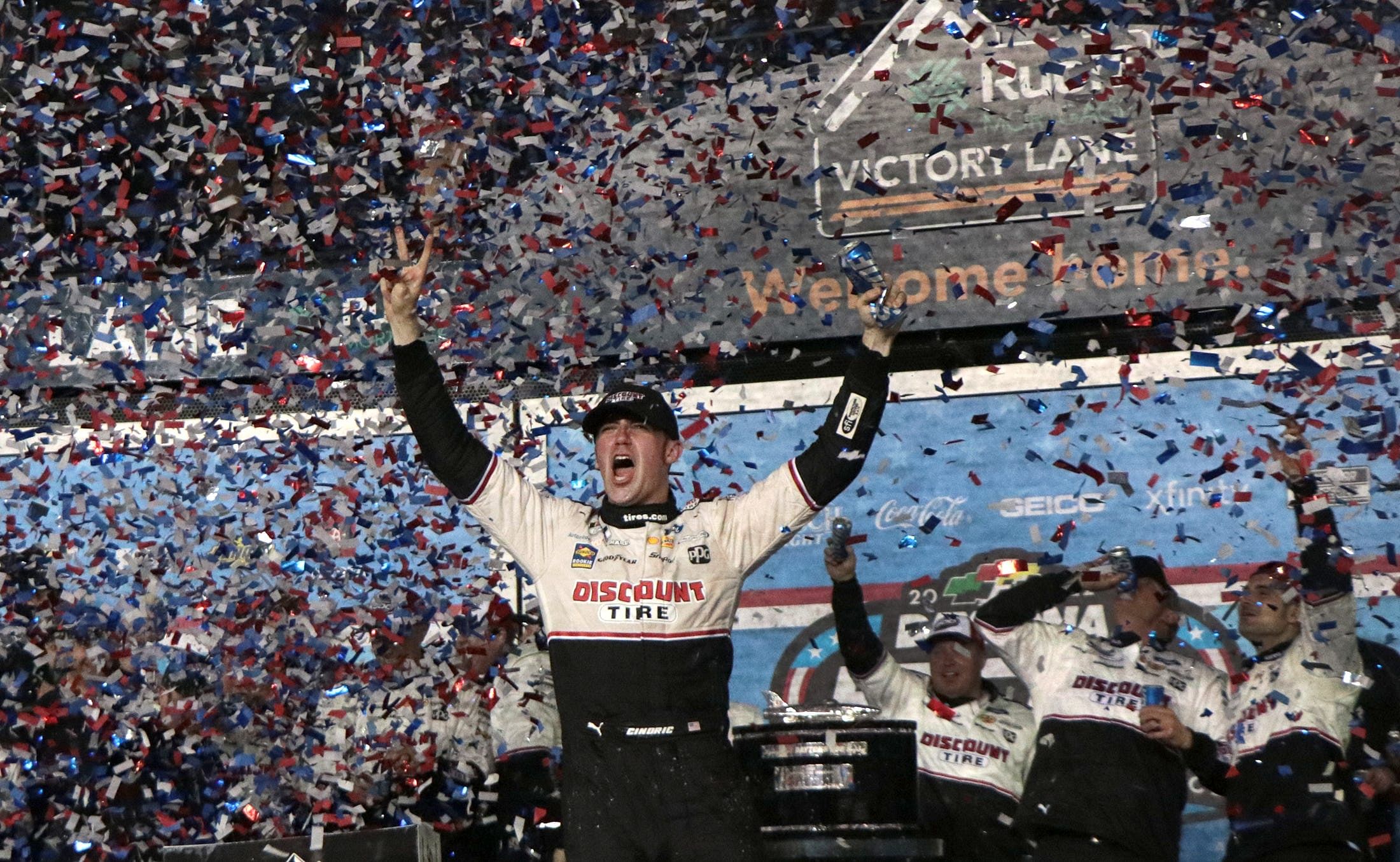 Austin Cindric stands on his no. 2 Ford in Victory Lane after his win at Daytona, Sunday night February 20, 2022 - Source: Imagn