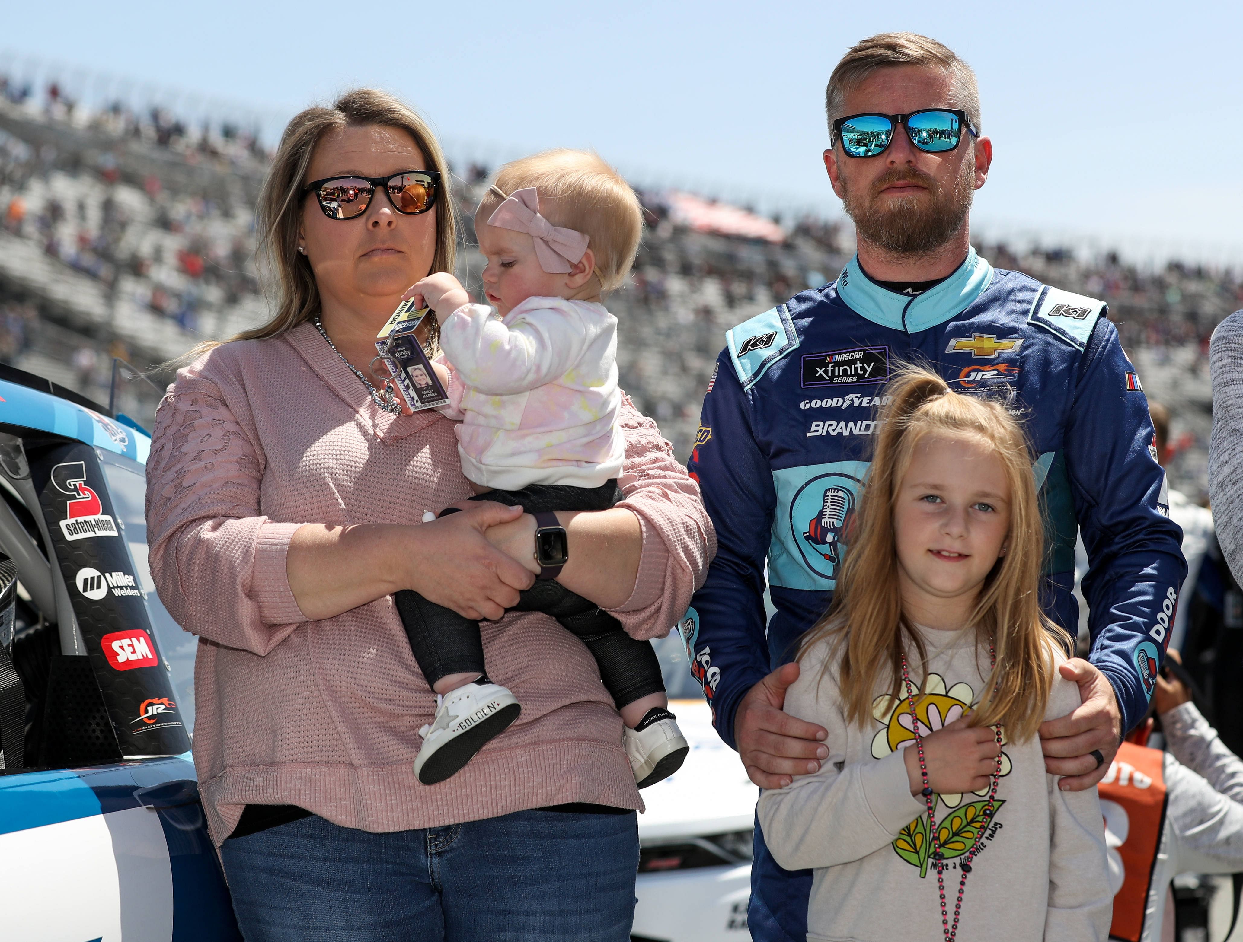 NASCAR Xfinity Series driver Justin Allgaier stands its his wife Ashley Allgaier and daughters Harper and Willow - Source: Imagn