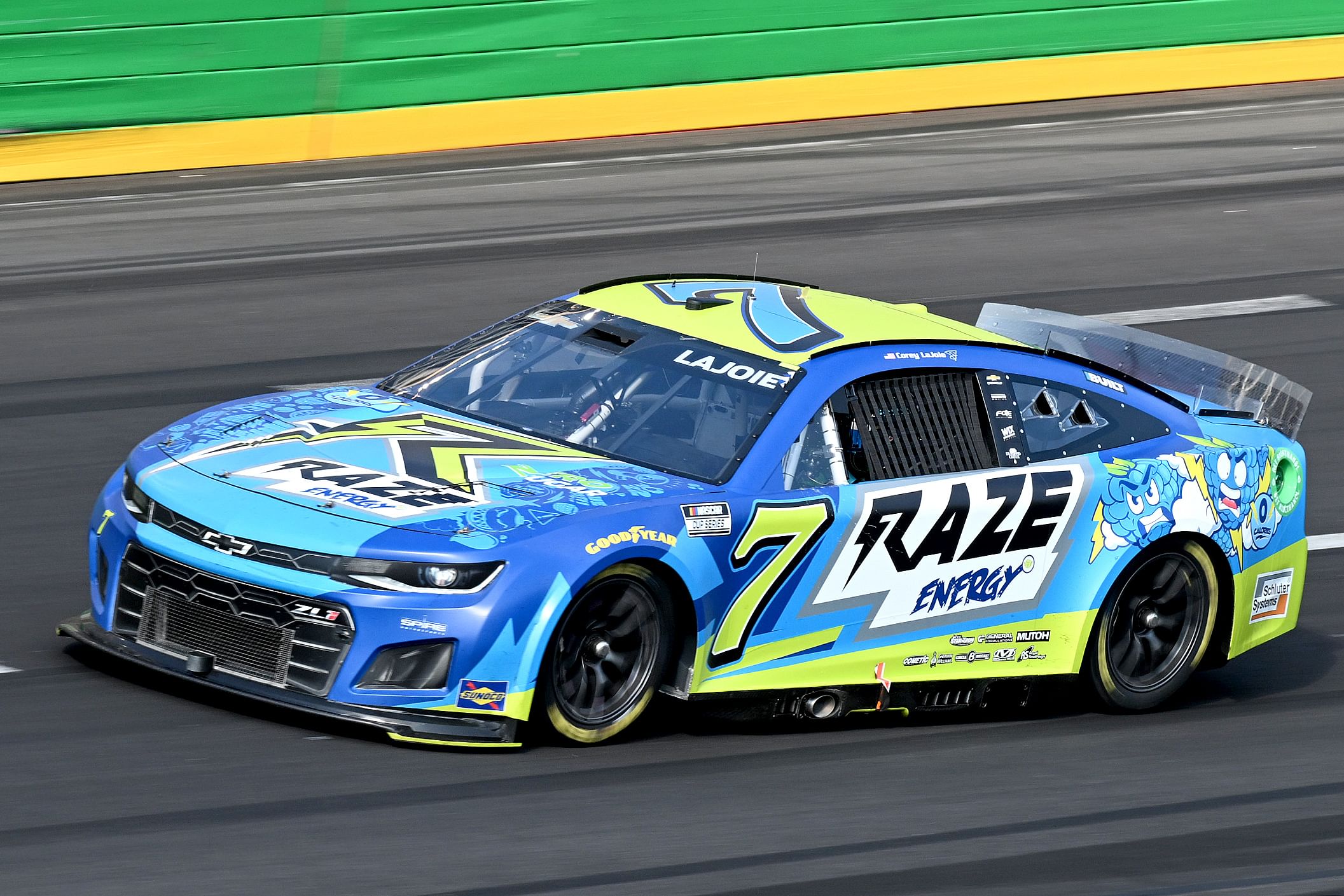 NASCAR Cup Series driver Corey LaJoie (7) races during the 2024 Quaker State 400 at Atlanta Motor Speedway - Source: Imagn