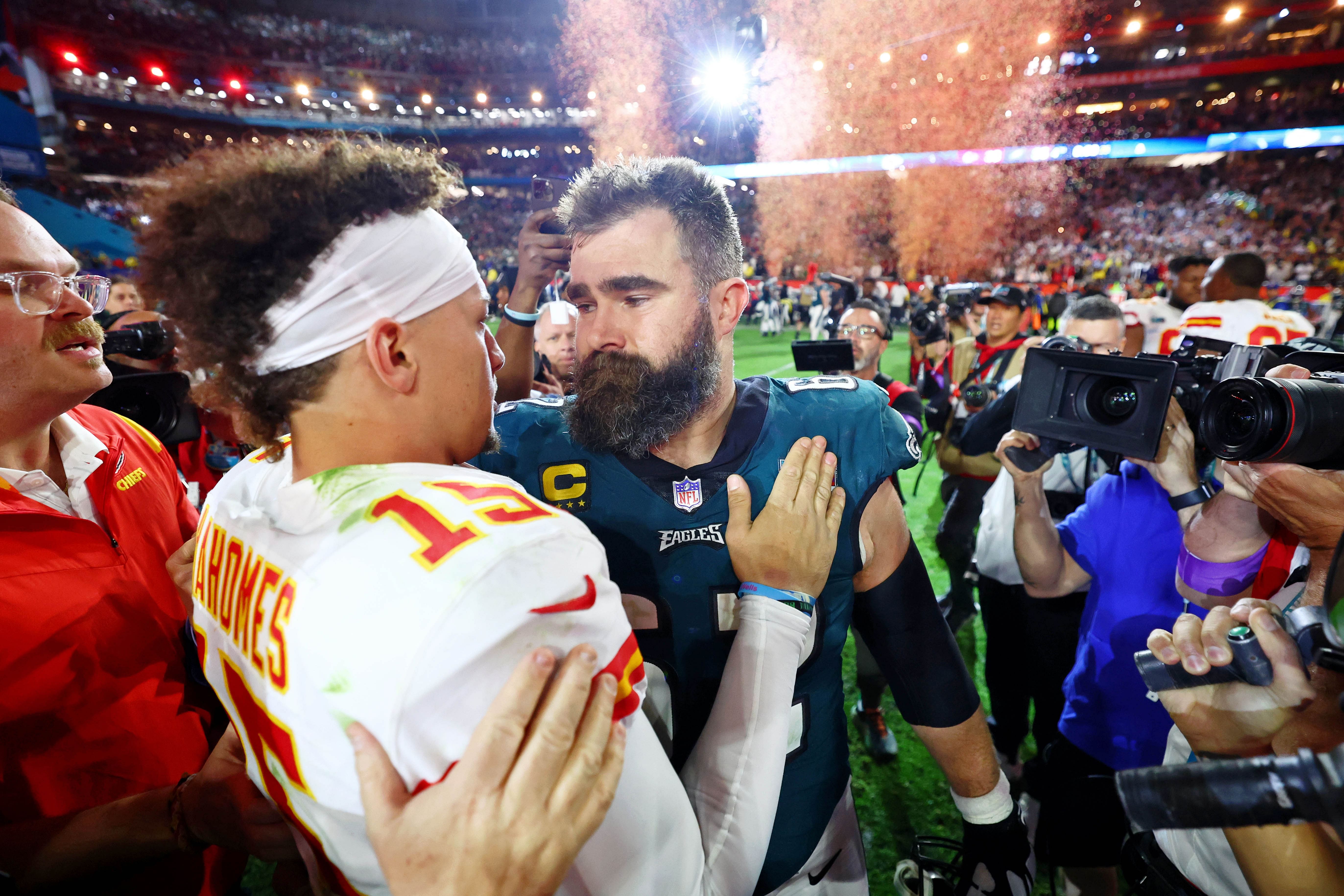 Feb 12, 2023; Glendale, Arizona, US; Kansas City Chiefs quarterback Patrick Mahomes (15) with Philadelphia Eagles center Jason Kelce (62) after Super Bowl LVII at State Farm Stadium. - Source: Imagn