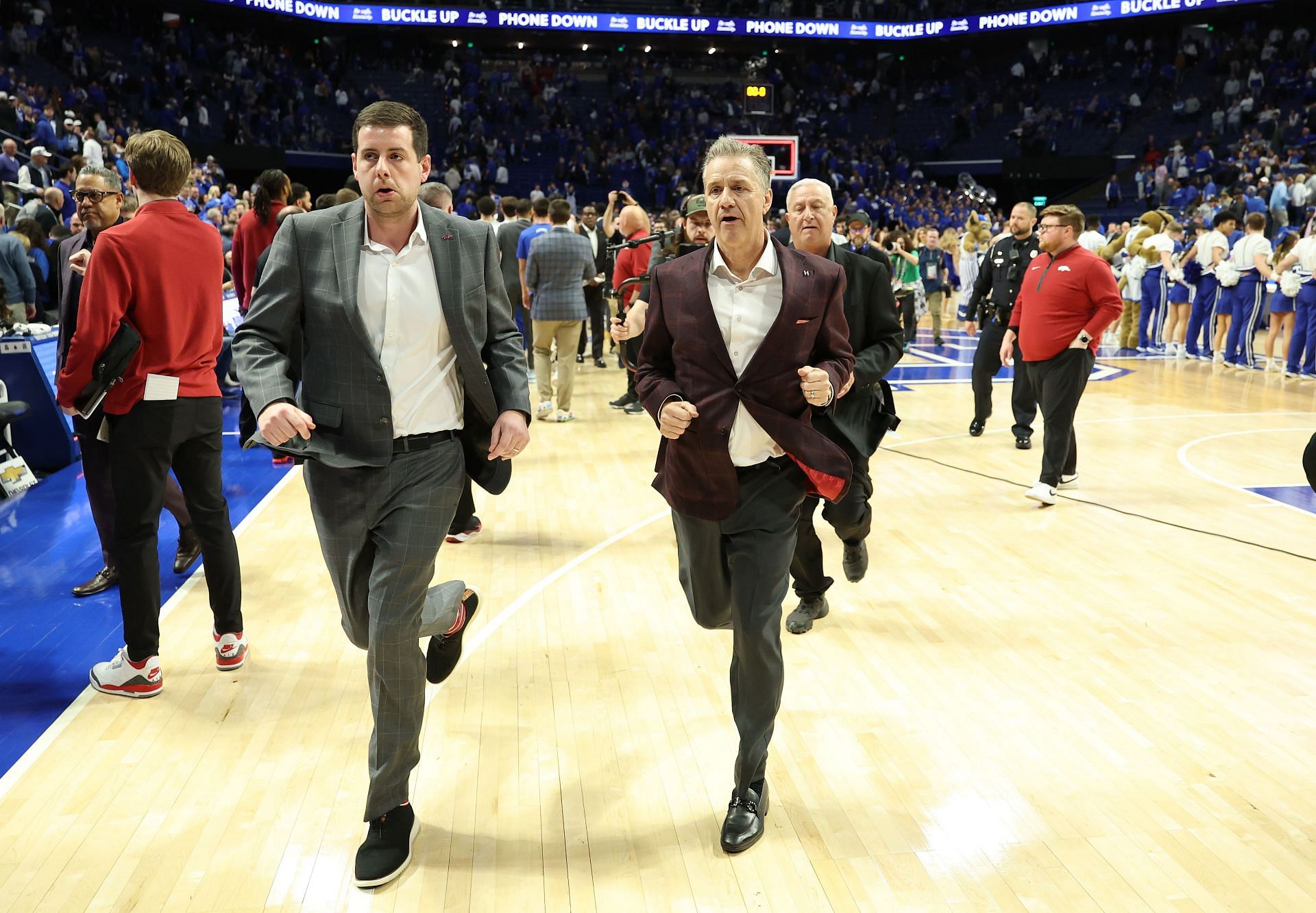 College Basketball: &lt;a href=&#039;https://www.sportskeeda.com/basketball/john-calipari&#039; target=&#039;_blank&#039; rel=&#039;noopener noreferrer&#039;&gt;John Calipari&lt;/a&gt; the head coach of the Arkansa &lt;a href=&#039;https://www.sportskeeda.com/college-basketball/arkansas-razorbacks&#039; target=&#039;_blank&#039; rel=&#039;noopener noreferrer&#039;&gt;Razorbacks&lt;/a&gt; runs off of the court following the 89-79 win over the Kentucky Wildcats at Rupp Arena - Source: Getty