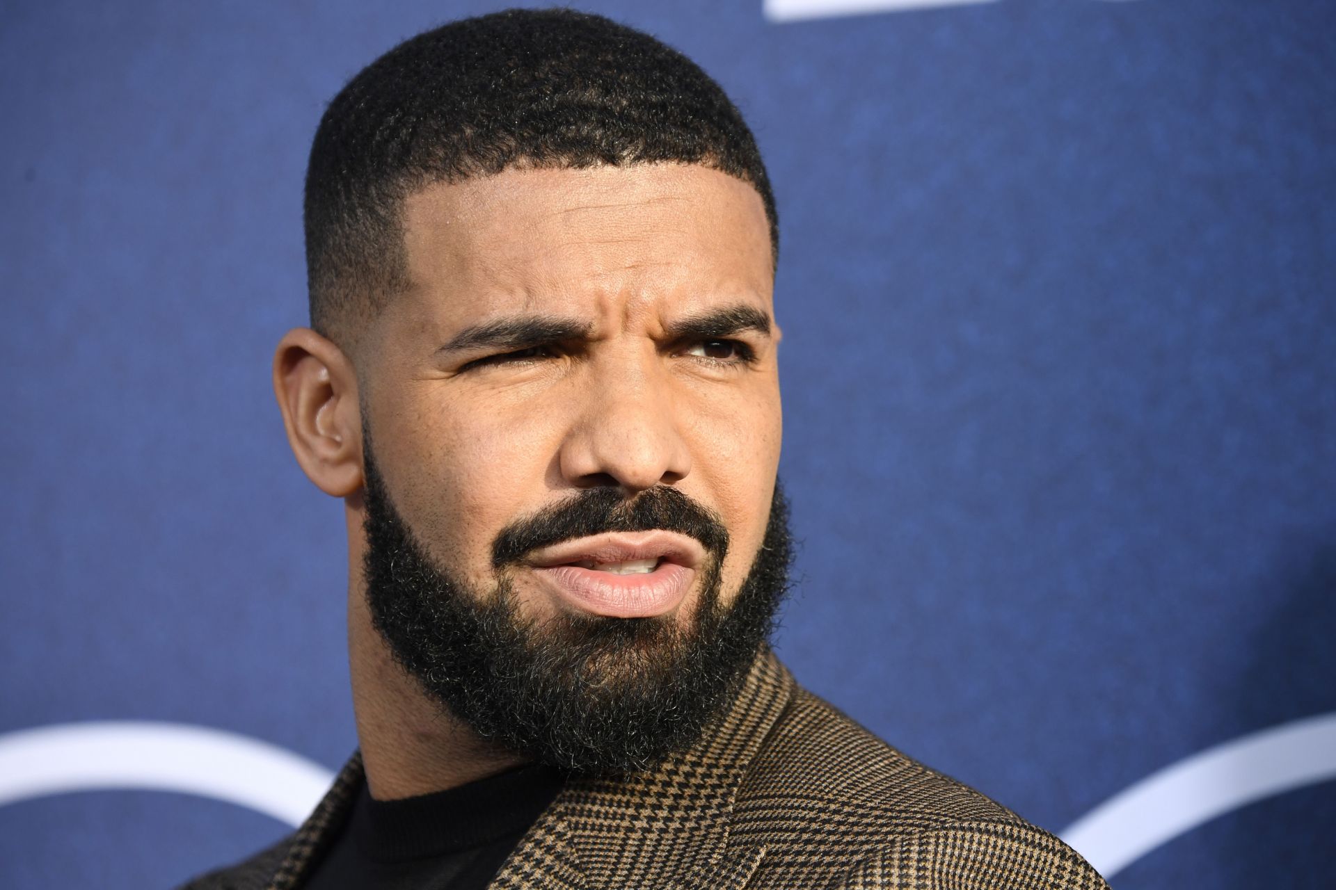 "You might not like him but this is wrong"— Netizens react as fake delivery drivers leave RIP Drake coffin at DJ Khaled's house