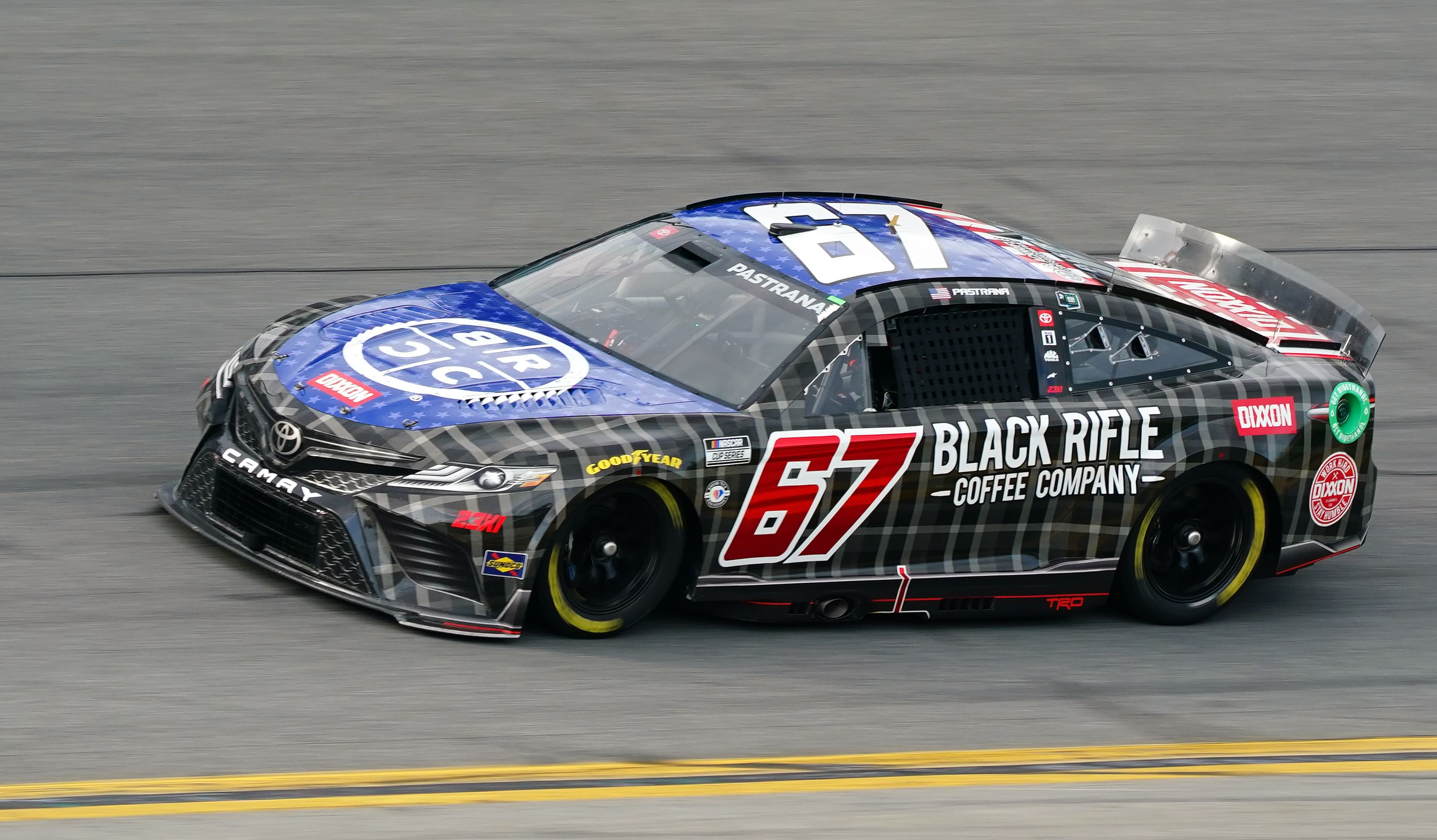 NASCAR Cup Series driver Travis Pastrana (67) races during the Daytona 500 at Daytona International Speedway. - Source: Imagn