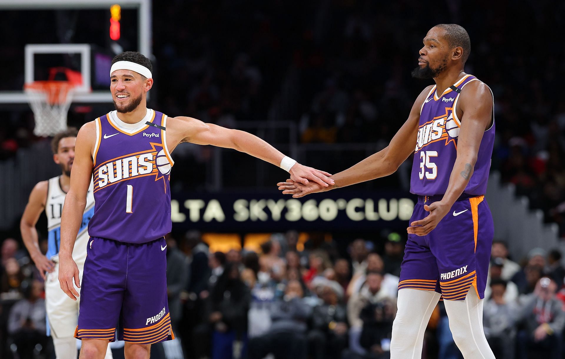 Devin Booker and Kevin Durant in action against the Atlanta Hawks for the Phoenix Suns - Source: Getty