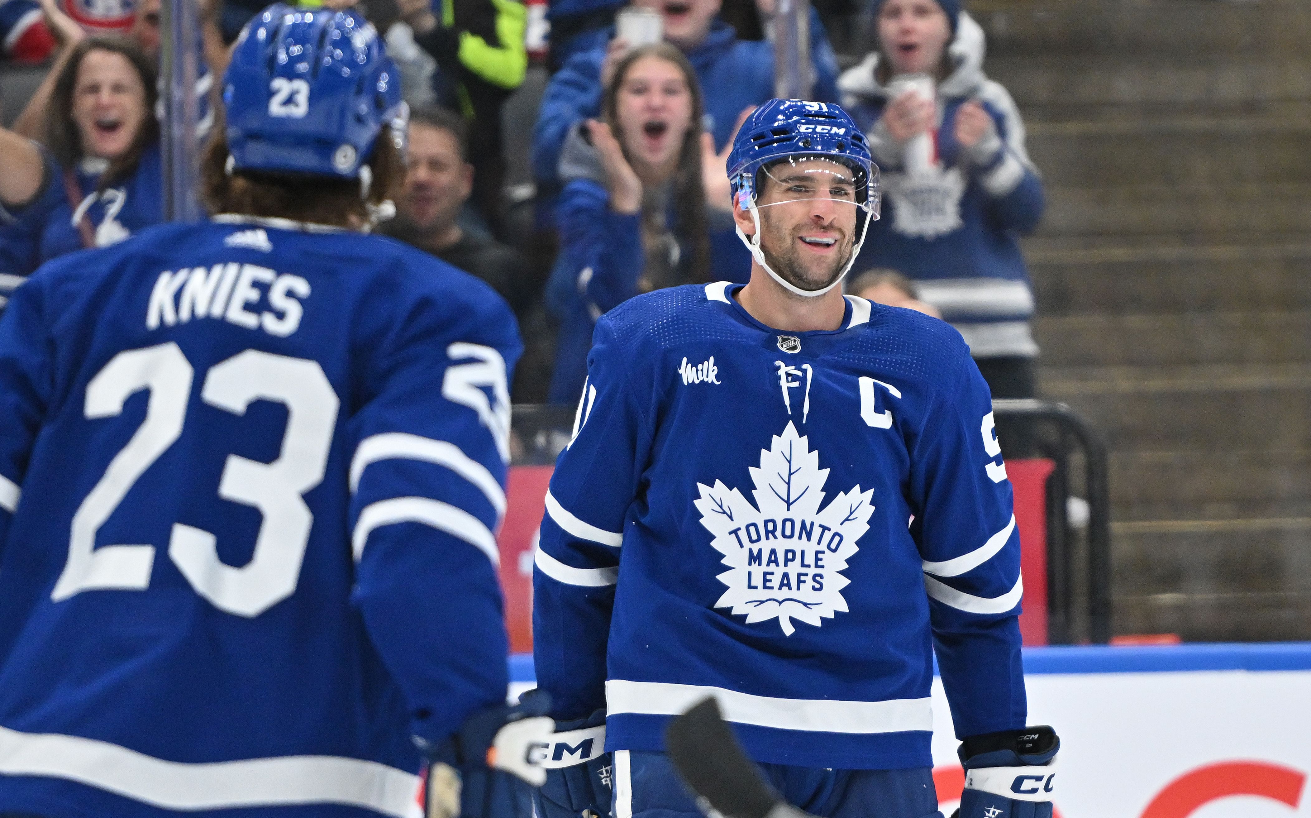 Toronto Maple Leafs forwards John Tavares (91) and Matthew Knies (23) during an NHL game. (Credits: IMAGN)