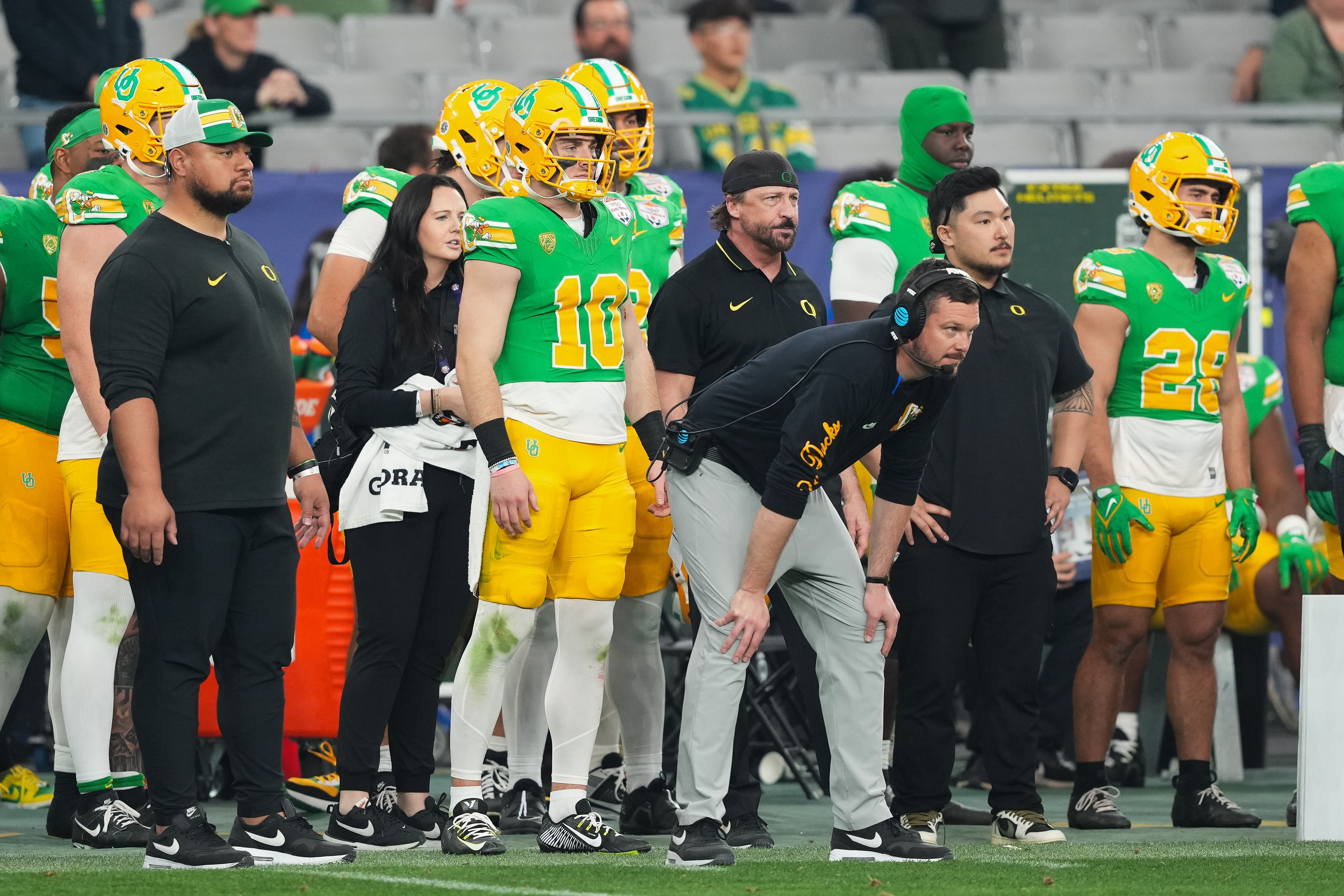 Oregon Ducks quarterback Bo Nix (10) stands next to head coach Dan Lanning - Source: Imagn