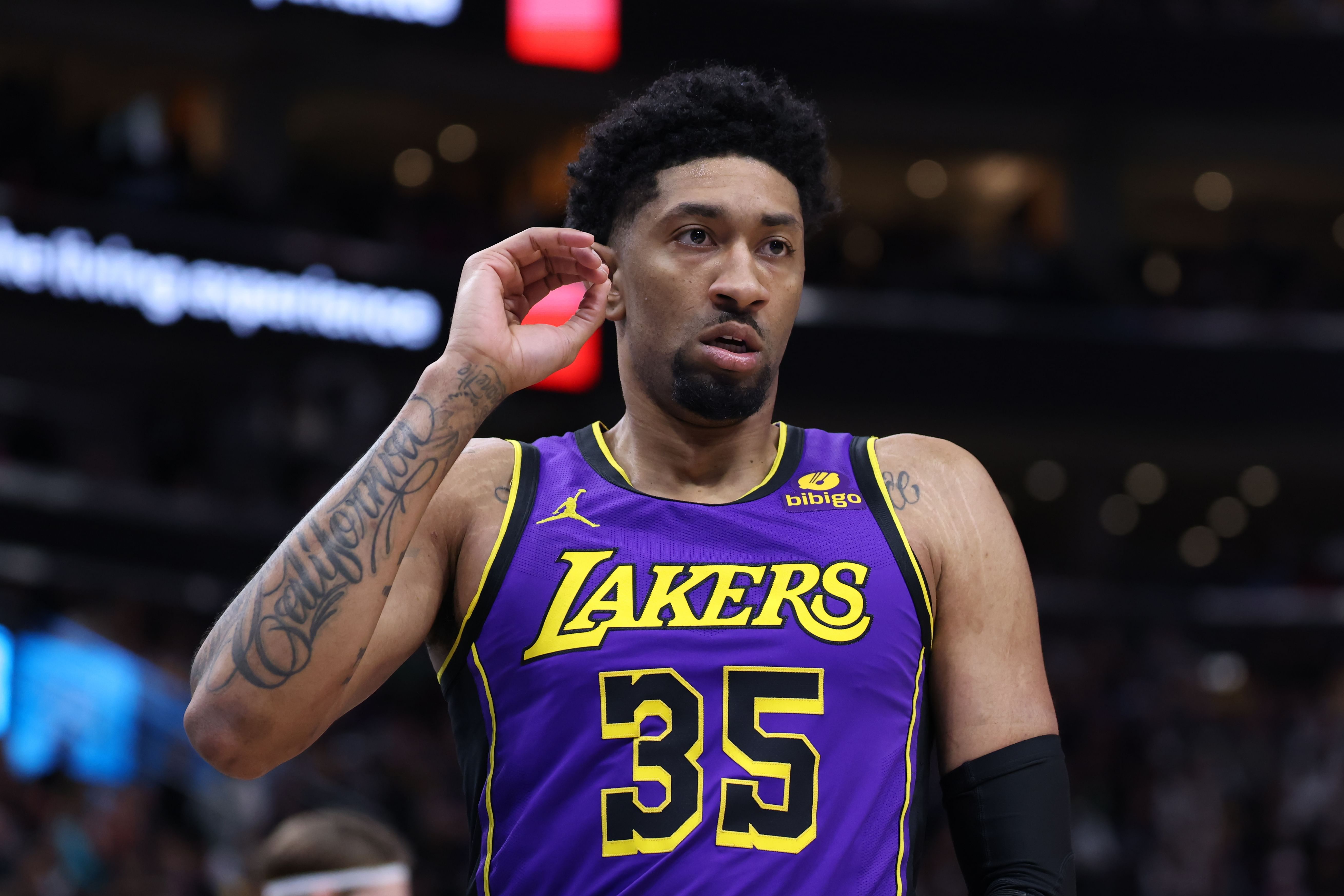 LA Lakers forward Christian Wood reacts to a play against the Utah Jazz at Delta Center. Photo Credit: Imagn