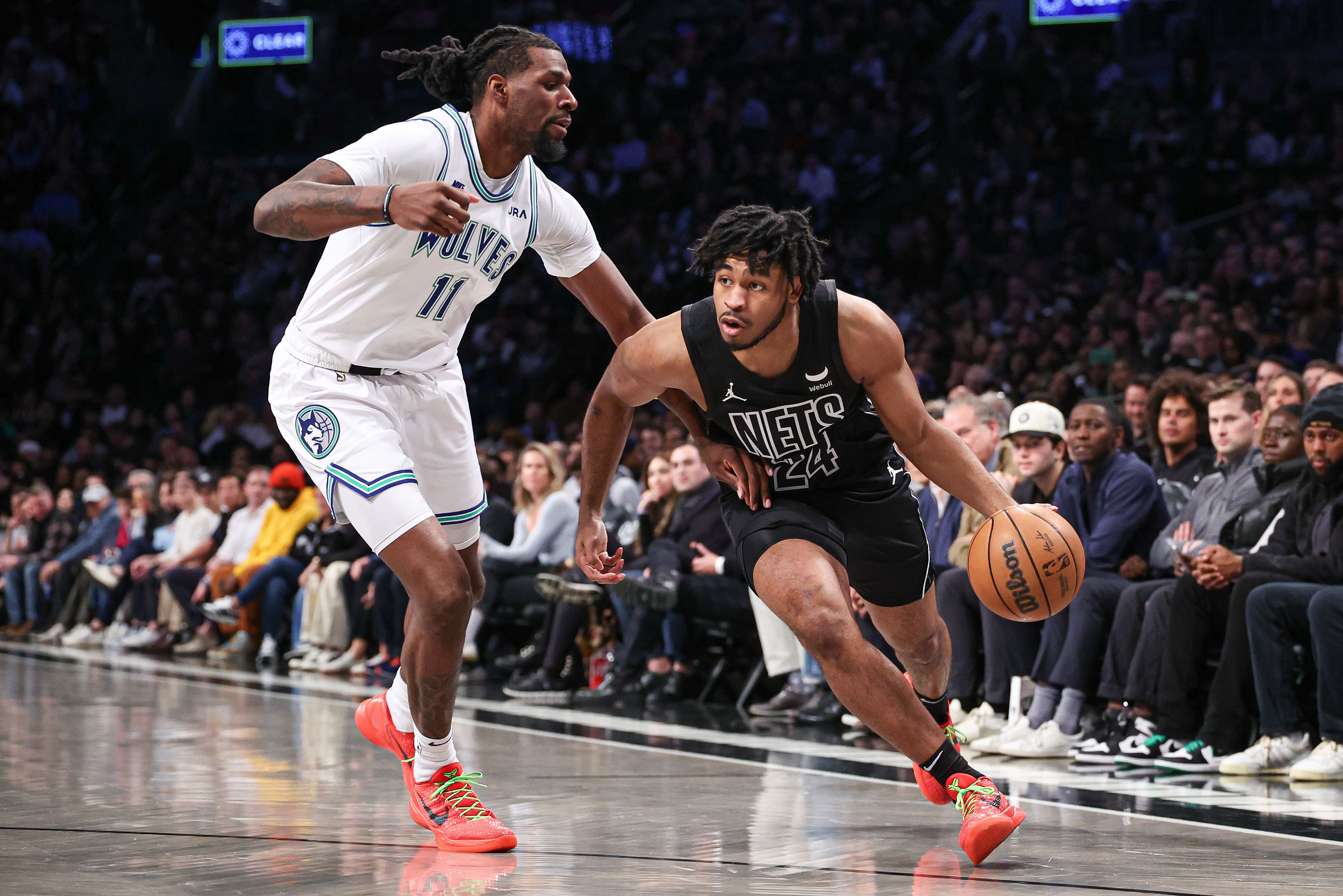 Minnesota Timberwolves big man Naz Reid and Brooklyn Nets shooting guard Cam Thomas (Image Credit: Vincent Carchietta-Imagn Images)