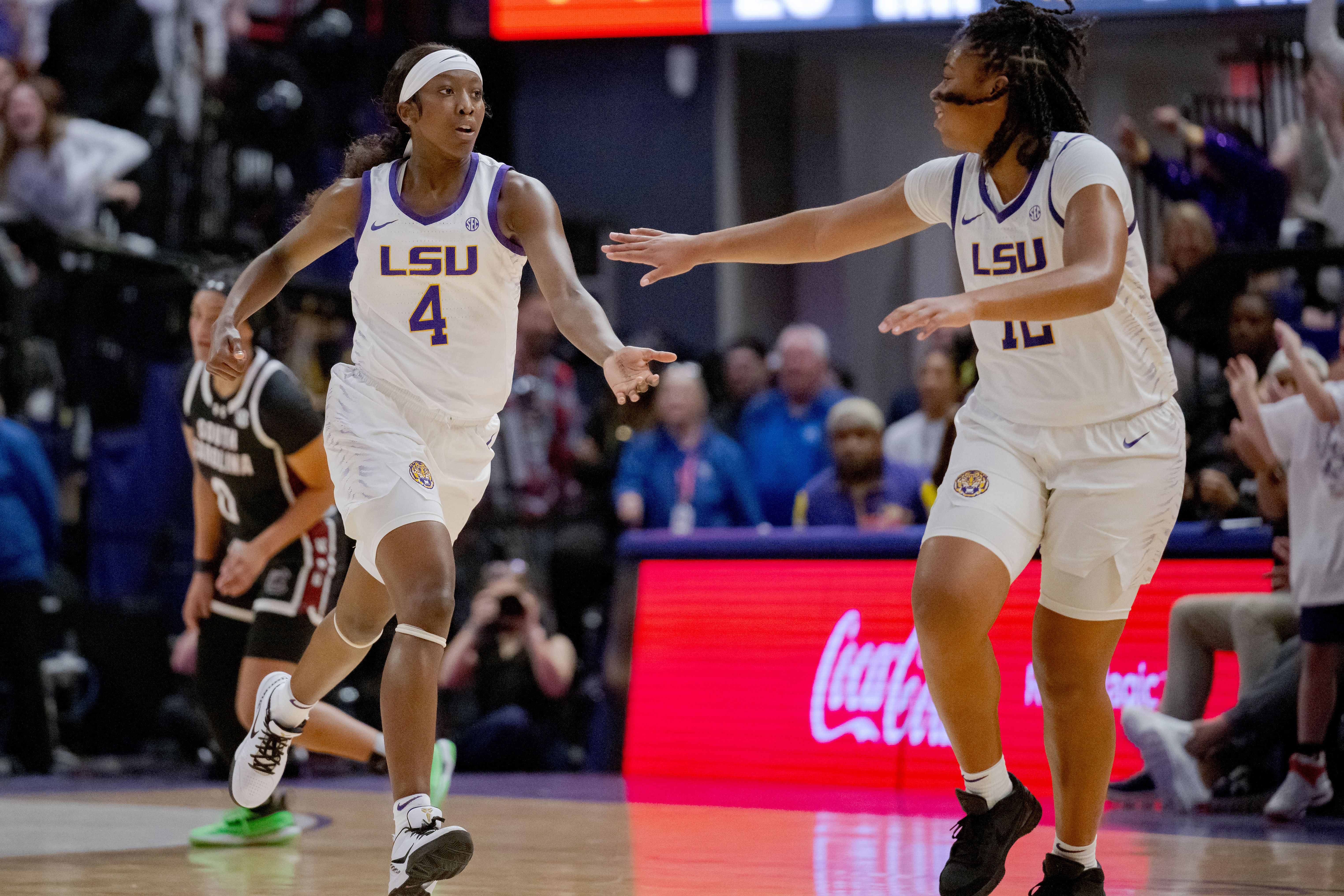 LSU Tigers guards Flau&#039;jae Johnson (#4) and Mikaylah Williams (#12) celebrate a score against the South Carolina Gamecocks during the first half at Pete Maravich Assembly Center. Photo: Imagn