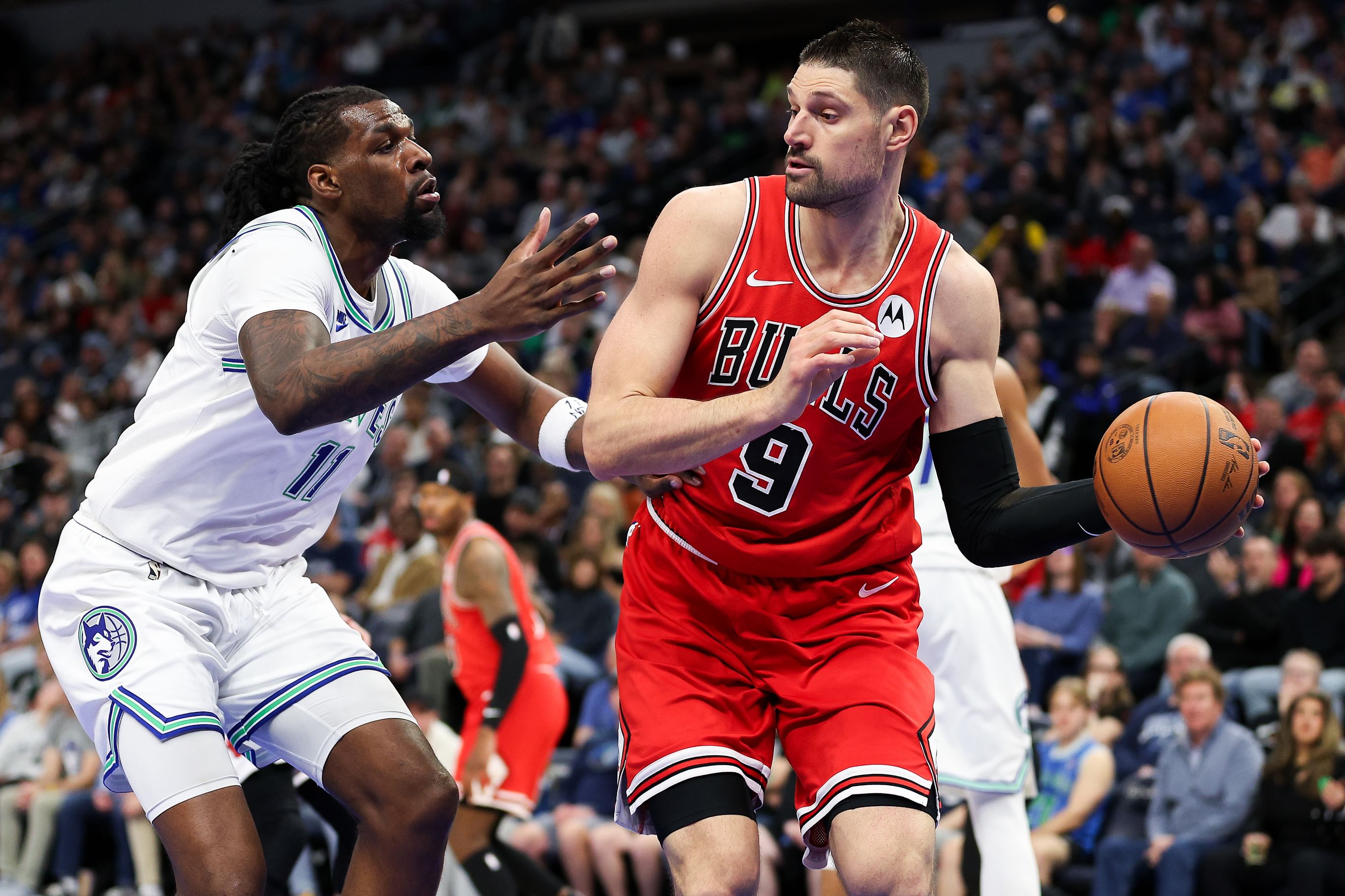 Minnesota Timberwolves big man Naz Reid and Chicago Bulls veteran center Nikola Vucevic (Image Credit: Matt Krohn-Imagn Images)