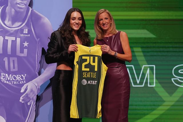 Apr 15, 2024; Brooklyn, NY, USA; Nika Muhl poses with WNBA commissioner Cathy Engelbert after she is selected with the number fourteen overall pick to the Seattle Storm in the 2024 WNBA Draft at Brooklyn Academy of Music. Mandatory Credit: Brad Penner-Imagn Images - Source: Imagn