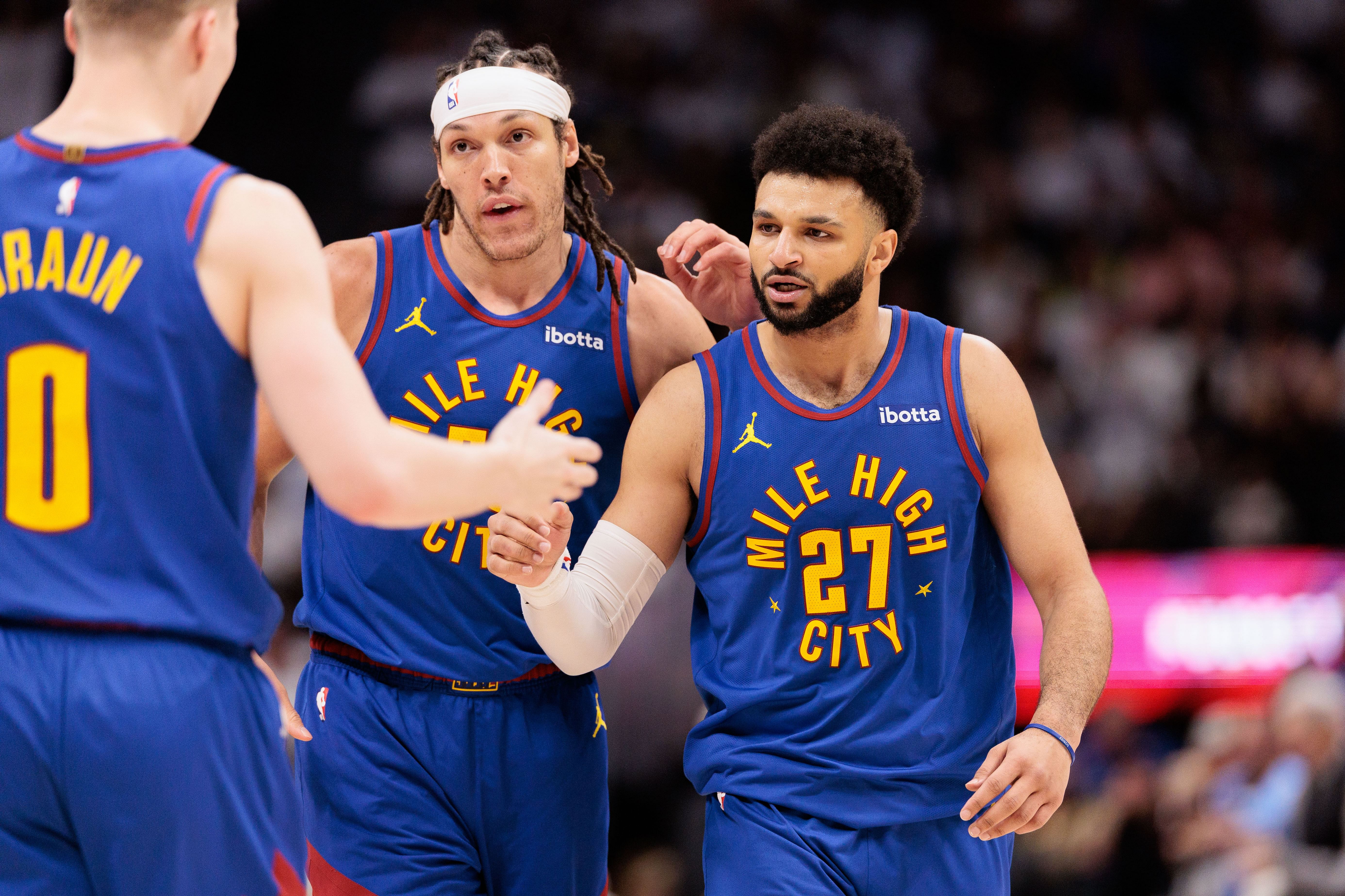 Denver Nuggets guard Jamal Murray and forward Aaron Gordon react against the Los Angeles Lakers in game one of the first round for the 2024 NBA playoffs at Ball Arena. Photo Credit: Imagn