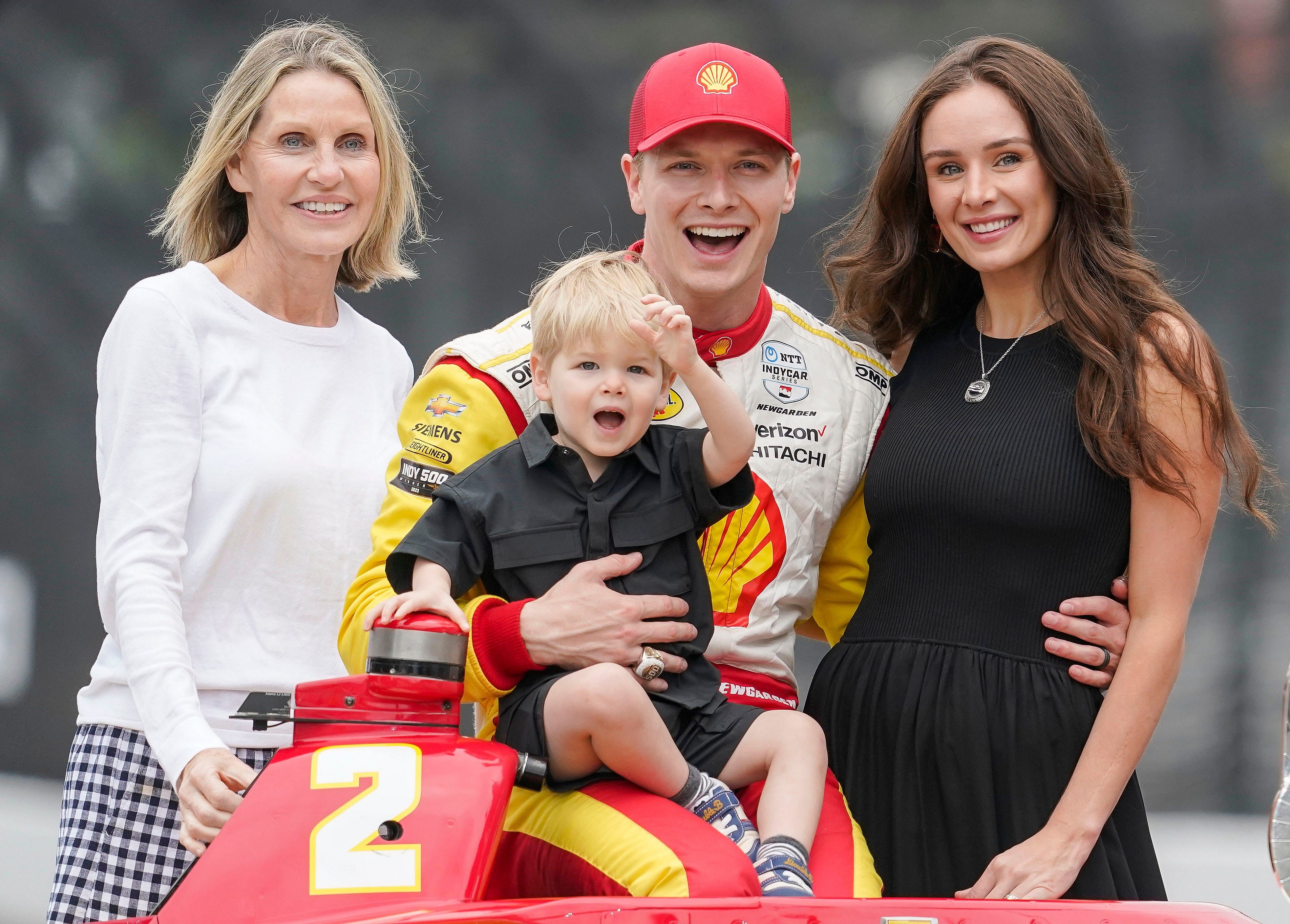 Team Penske driver Josef Newgarden (2) smiles for a photo his son Kota, his mother, left, and his wife Ashley on Monday, May 27, 2024, after winning the 108th running of the Indianapolis 500 at Indianapolis Motor Speedway. - Source: Imagn