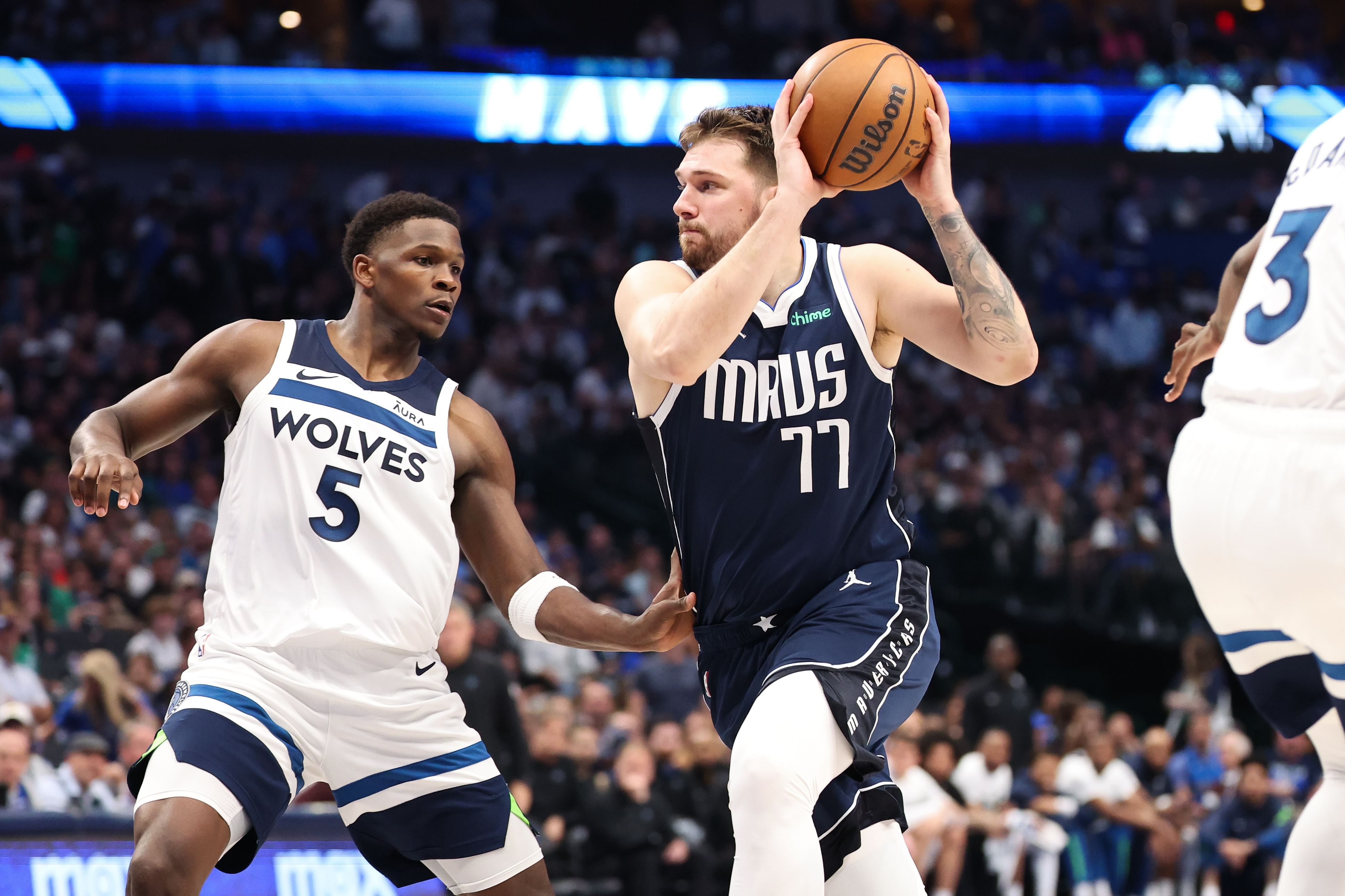 Dallas Mavericks guard Luka Doncic dribbles against Minnesota Timberwolves guard Anthony Edwards during the 2024 NBA playoffs at American Airlines Center. Photo Credit: Imagn