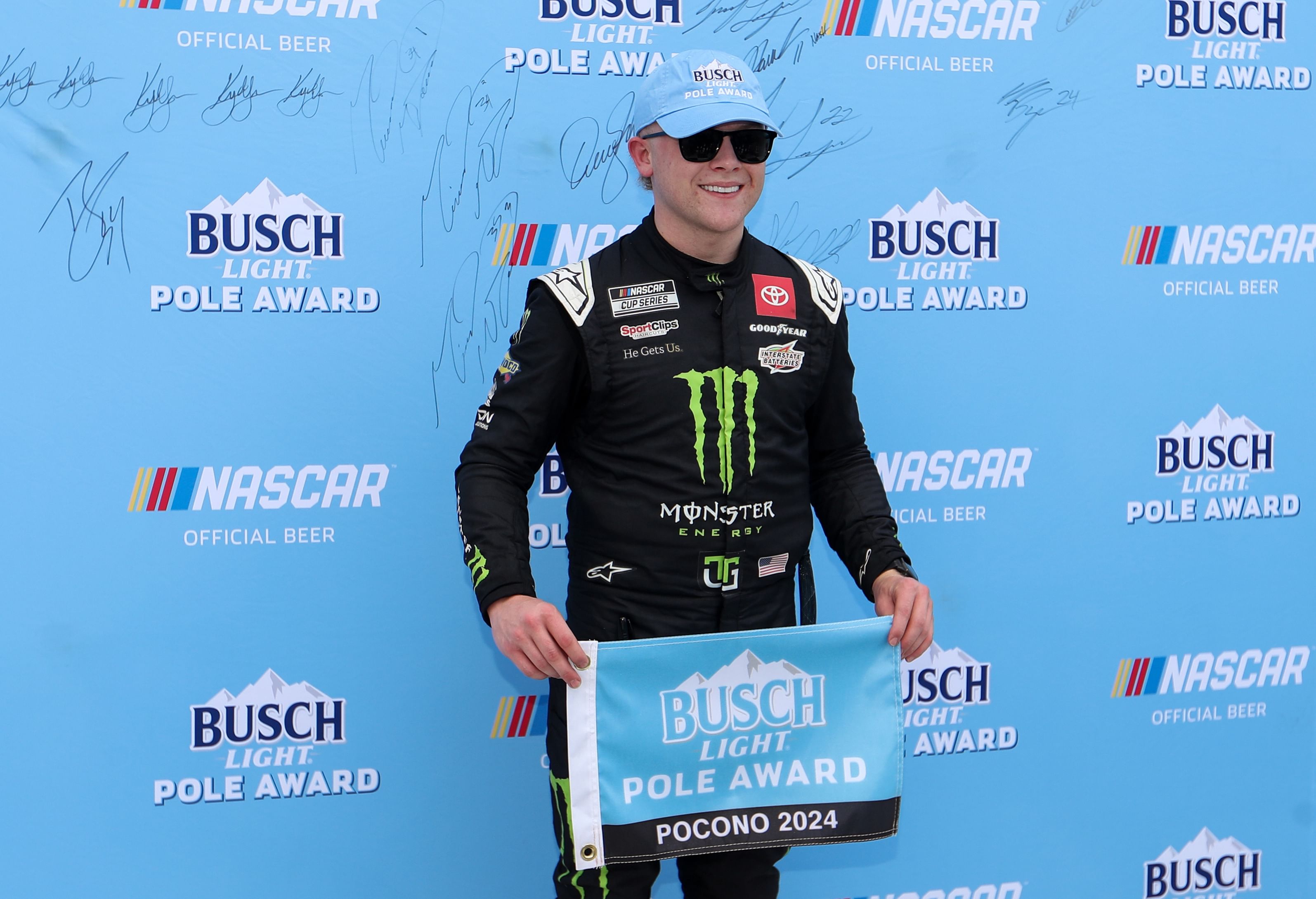 NASCAR Cup Series driver Ty Gibbs stands with the Busch Light Pole Award after winning the pole for The Great American Getaway 400 at Pocono Raceway. Mandatory Credit: Matthew O&#039;Haren-Imagn Images