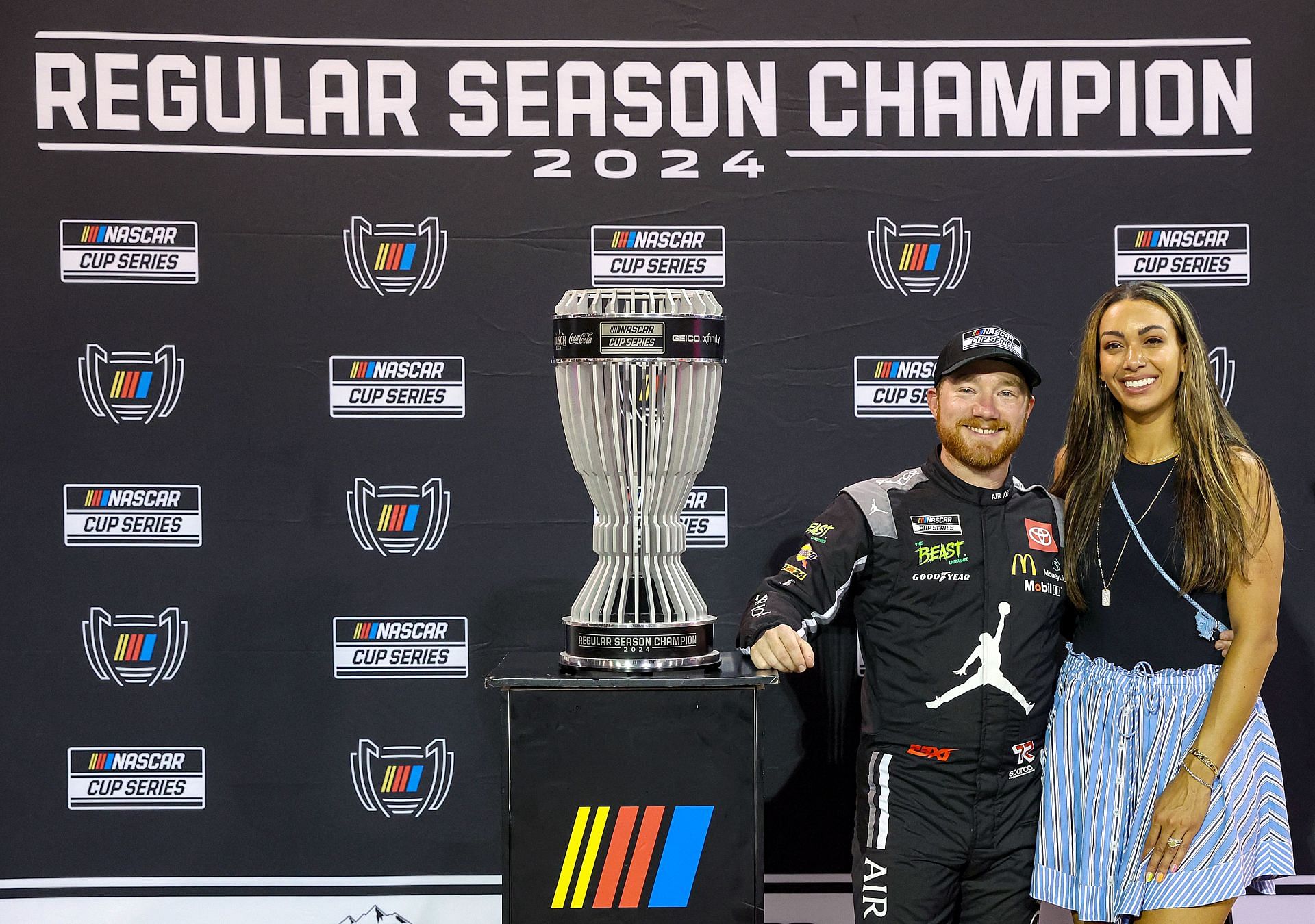 Tyler Reddick poses with wife Alexa after the NASCAR Cup Series Cook Out Southern 500 at Darlington Raceway - Source: Getty