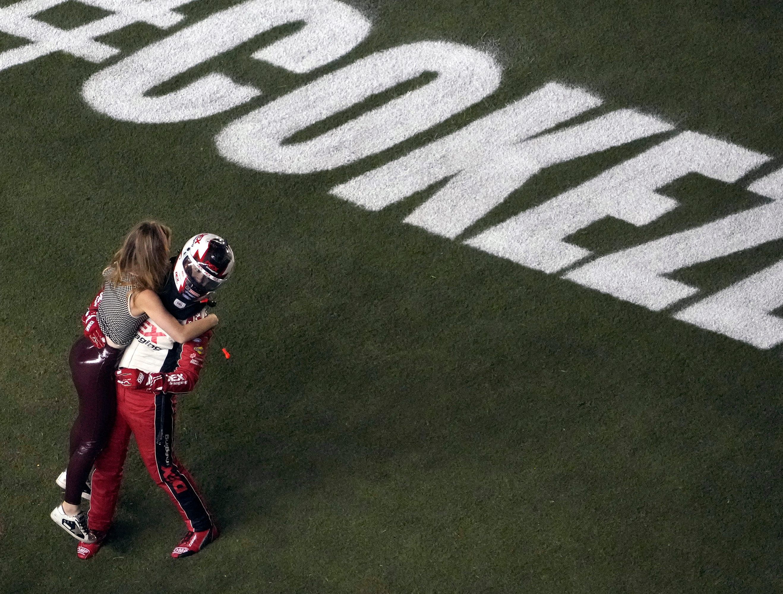 Harrison Burton celebrating the Coke Zero Sugar victory with Jenna Petty - Source: Imagn