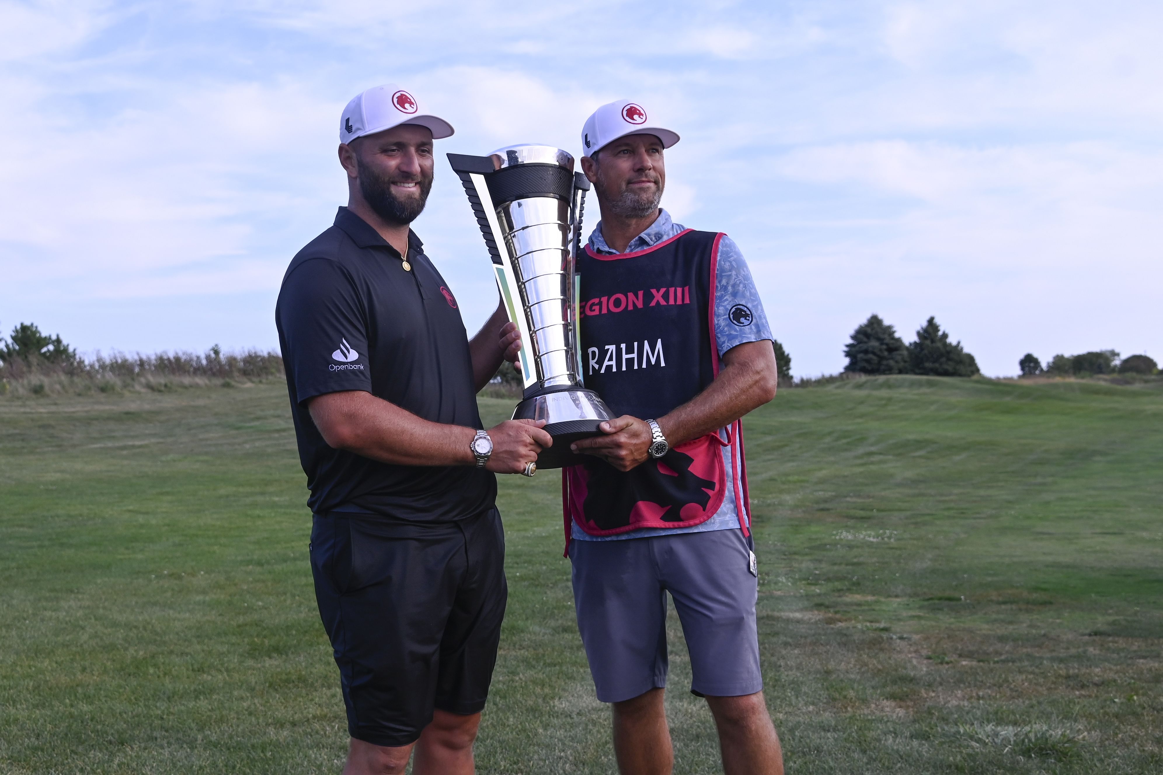 Jon Rahm with his caddie after winning the 2024 LIV Golf Chicago - Source: Imagn