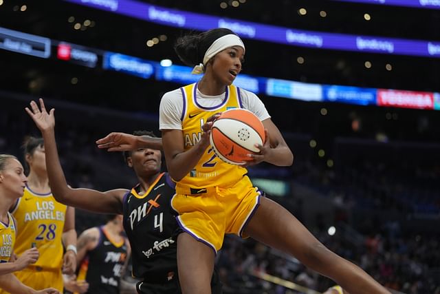 LA Sparks forward Rickea Jackson rebounds the ball against the Phoenix Mercury at Crypto.com Arena. Photo Credit: Imagn