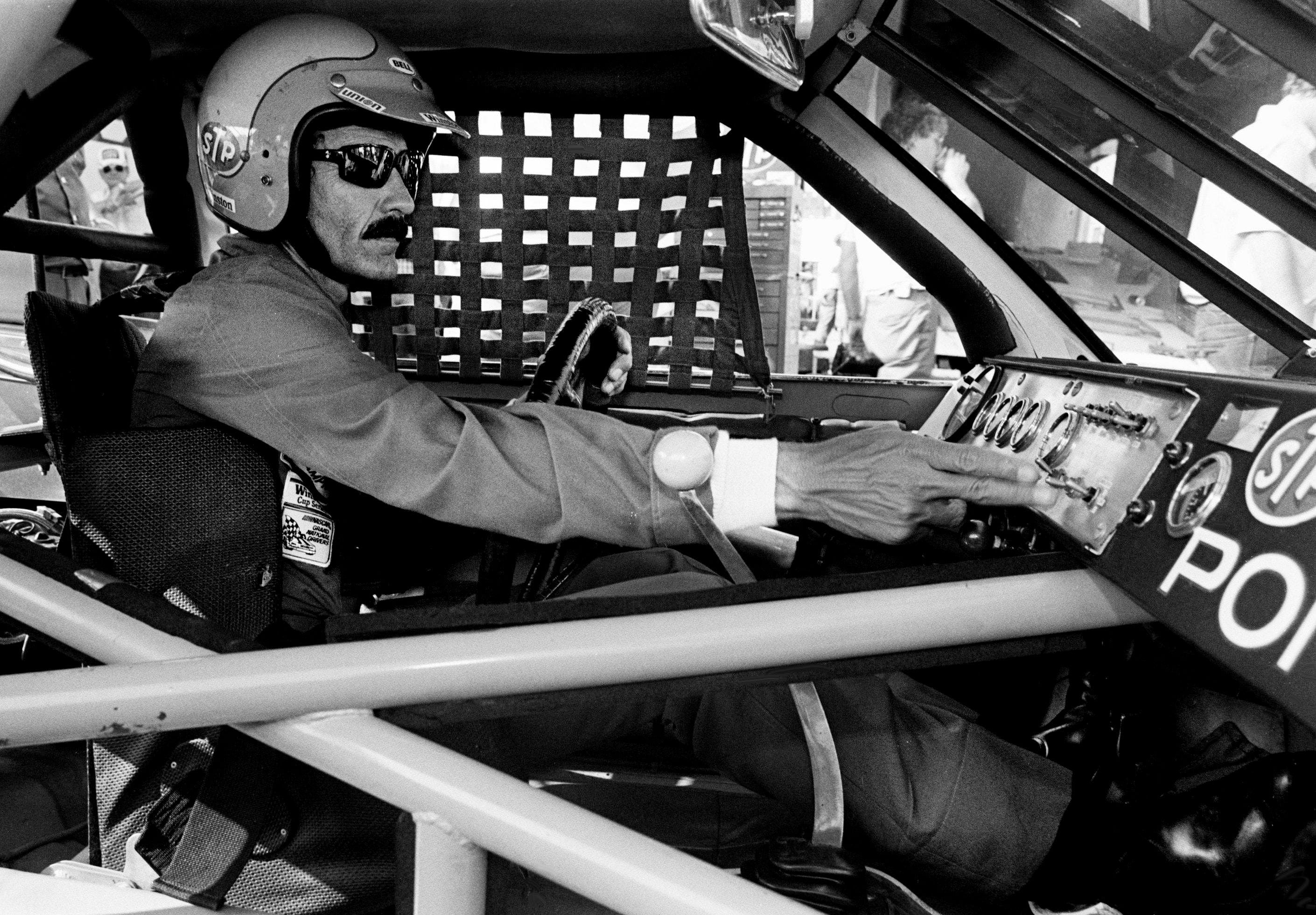 Richard Petty checks the controls during qualifying trials for the Nashville Pepsi 420 NASCAR Grand National race at Nashville International Raceway on July 13, 1984. - Source: Imagn