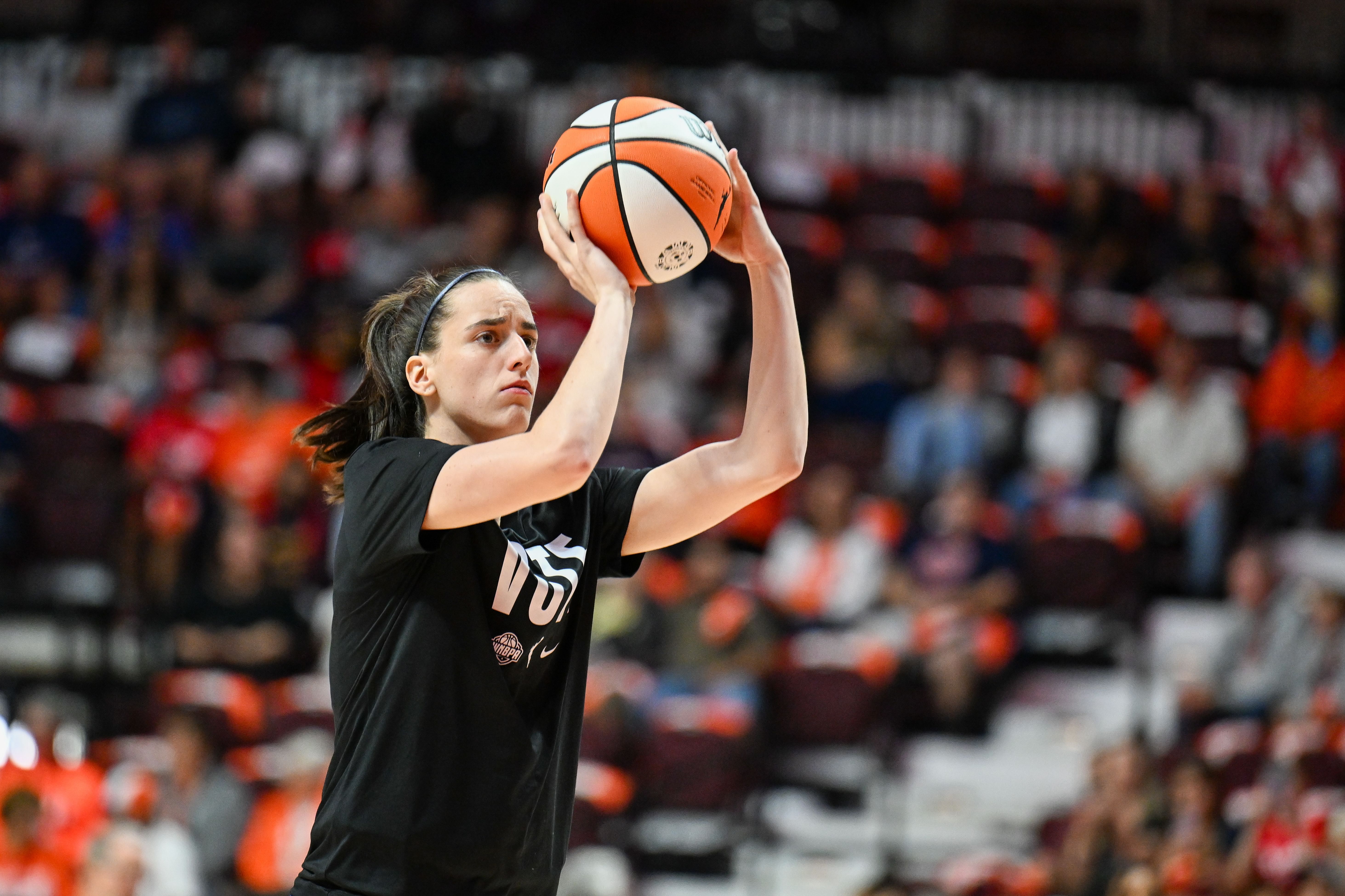 Caitlin Clark warms up before game one of the first round of the 2024 WNBA Playoffs at Mohegan Sun Arena. Photo Credit: Imagn