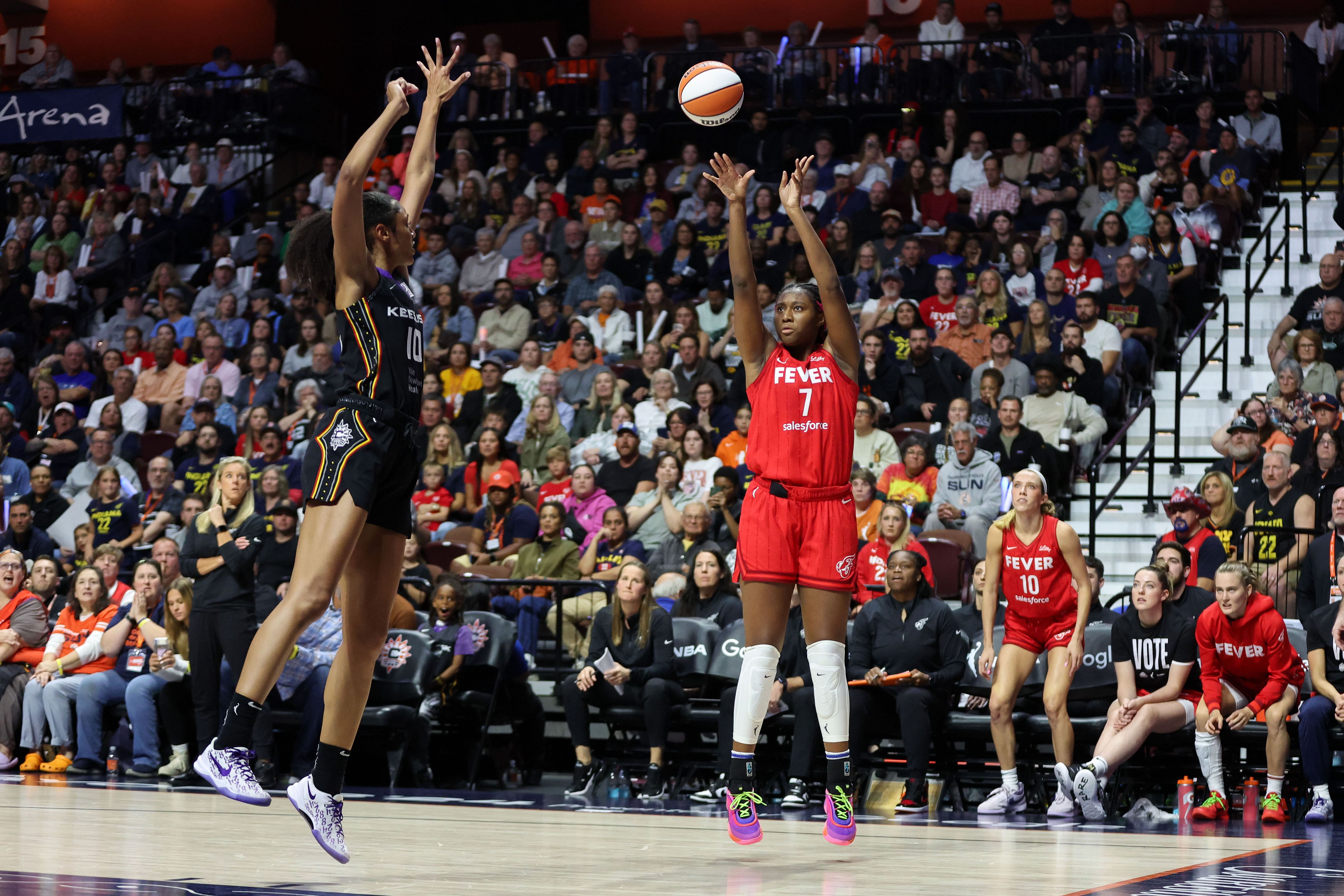 Sep 25, 2024; Uncasville, Connecticut, USA; Indiana Fever forward Aliyah Boston (7) shoots during the first half against the Connecticut Sun during game two of the first round of the 2024 WNBA Playoffs at Mohegan Sun Arena. Mandatory Credit: Paul Rutherford-Imagn Images - Source: Imagn