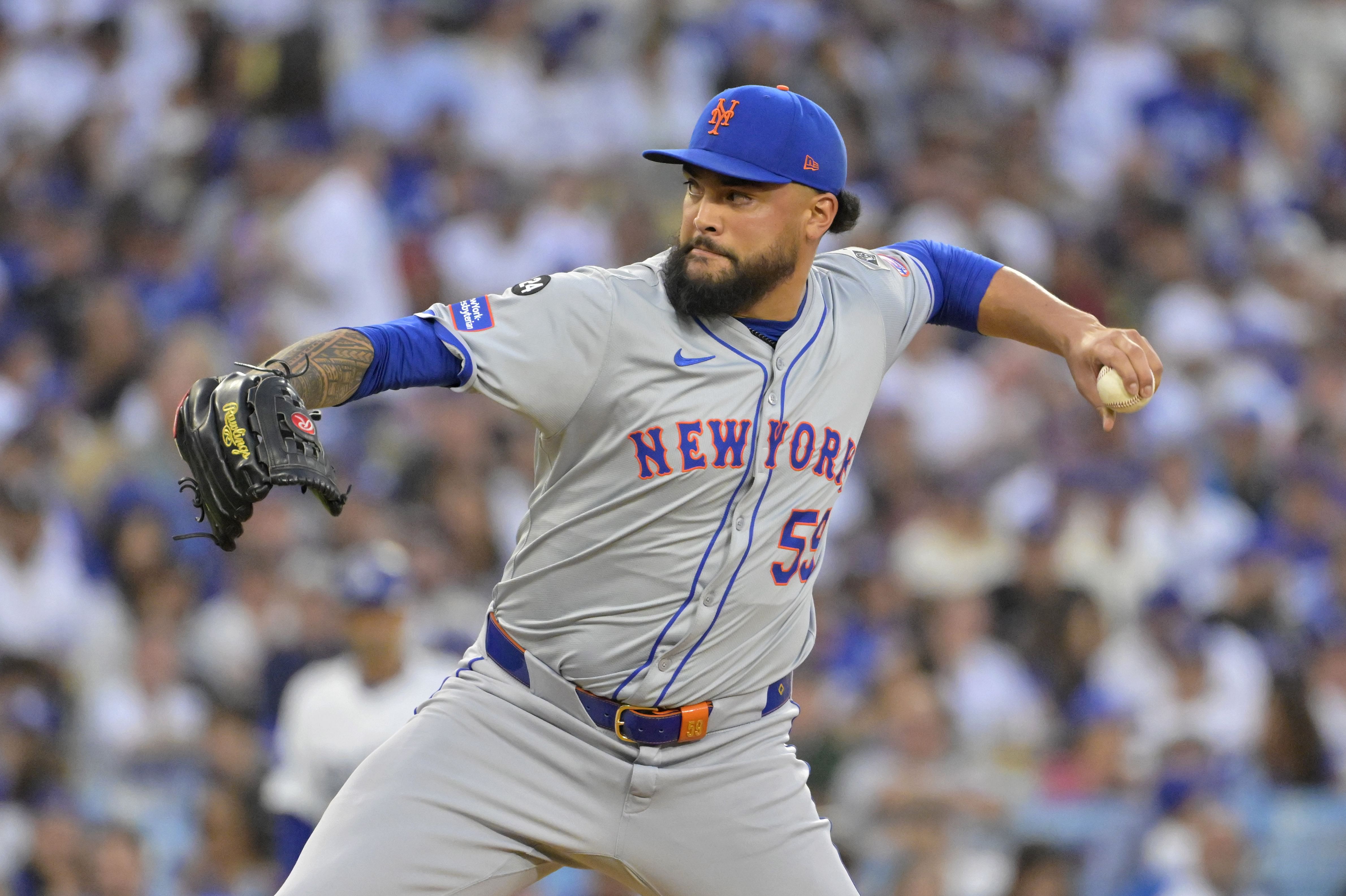 Oct 20, 2024; Los Angeles, California, USA; New York Mets pitcher Sean Manaea (59) pitches against the Los Angeles Dodgers in the second inning during game six of the NLCS for the 2024 MLB playoffs at Dodger Stadium. Mandatory Credit: Jayne Kamin-Oncea-Imagn Images - Source: Imagn