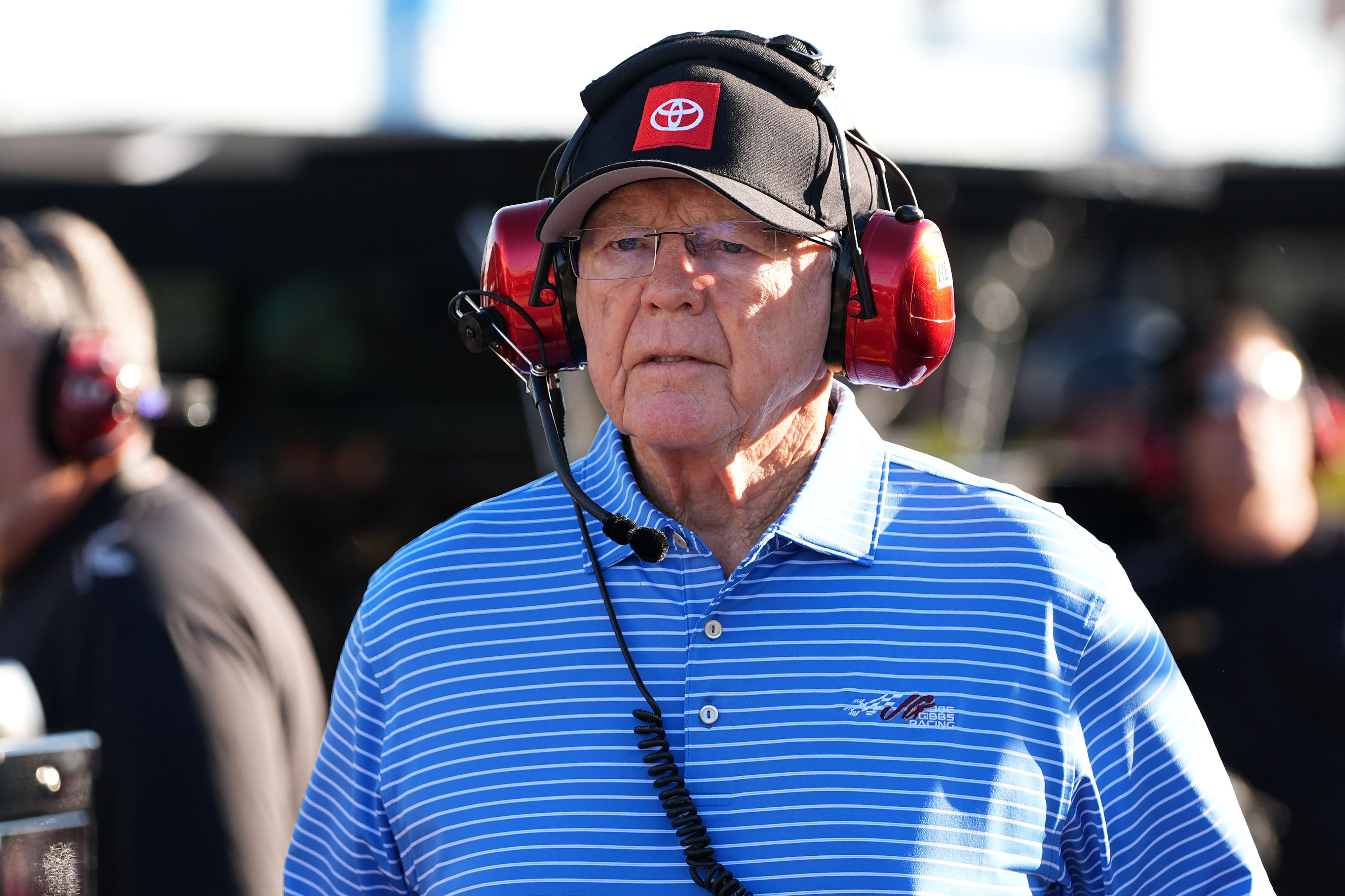 Joe Gibbs walks down the pit lane during practice for the Straight Talk Wireless 400 at Homestead-Miami Speedway. - Source: Imagn