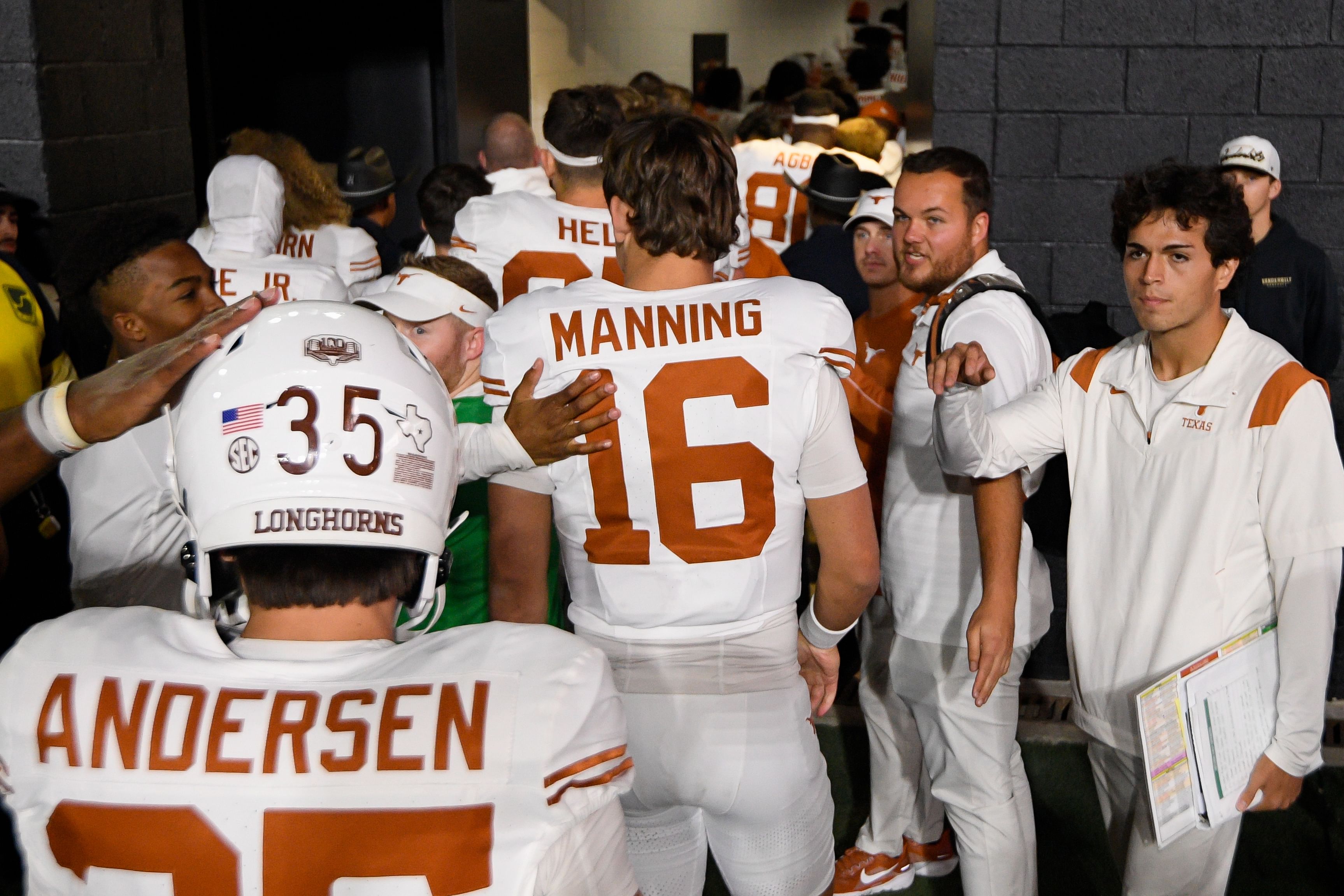 Arch Manning (16) walks off the field - Source: Imagn