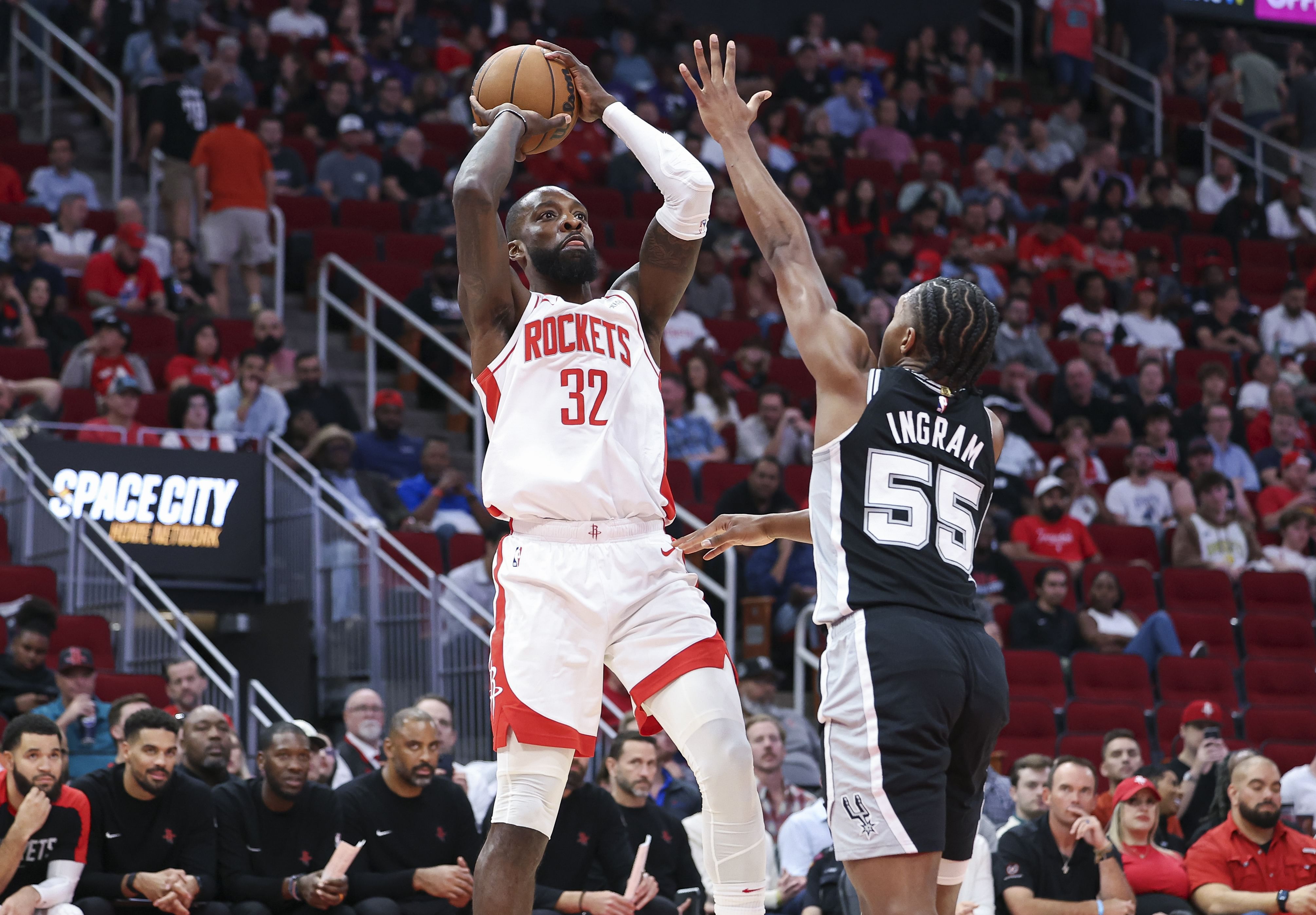 Nov 6, 2024; Houston, Texas, USA; Houston Rockets forward Jeff Green (32) shoots the ball as San Antonio Spurs forward Harrison Ingram (55) defends during the second half at Toyota Center. Mandatory Credit: Troy Taormina-Imagn Images - Source: Imagn