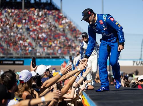  Jimmie Johnson greets fans prior to the NASCAR Cup Series Championship race at Phoenix Raceway - Source: Imagn