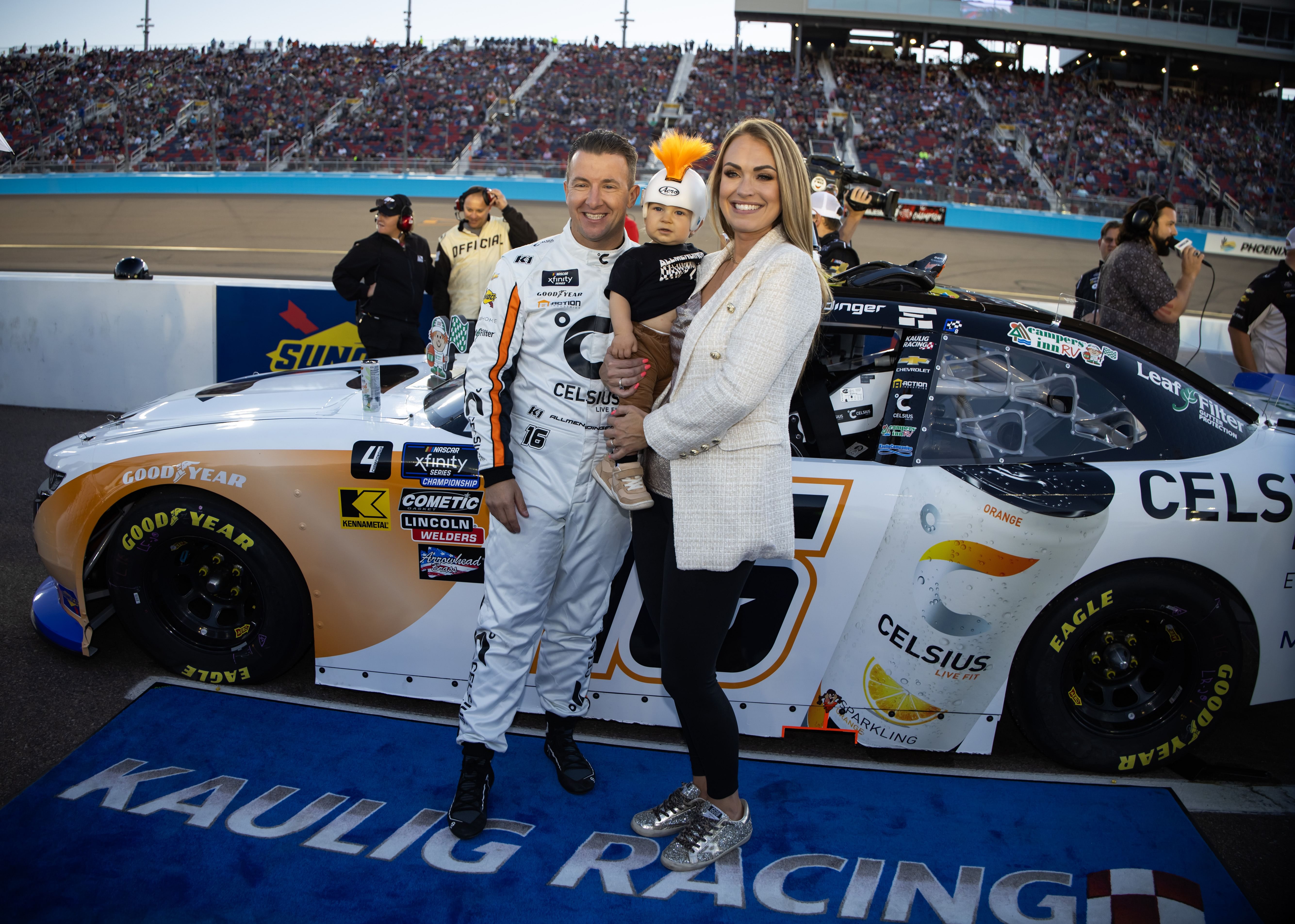 AJ Allmendinger with wife Tara Allmendinger and son Aero Allmendinger during the Championship race at Phoenix Raceway - Source: Imagn