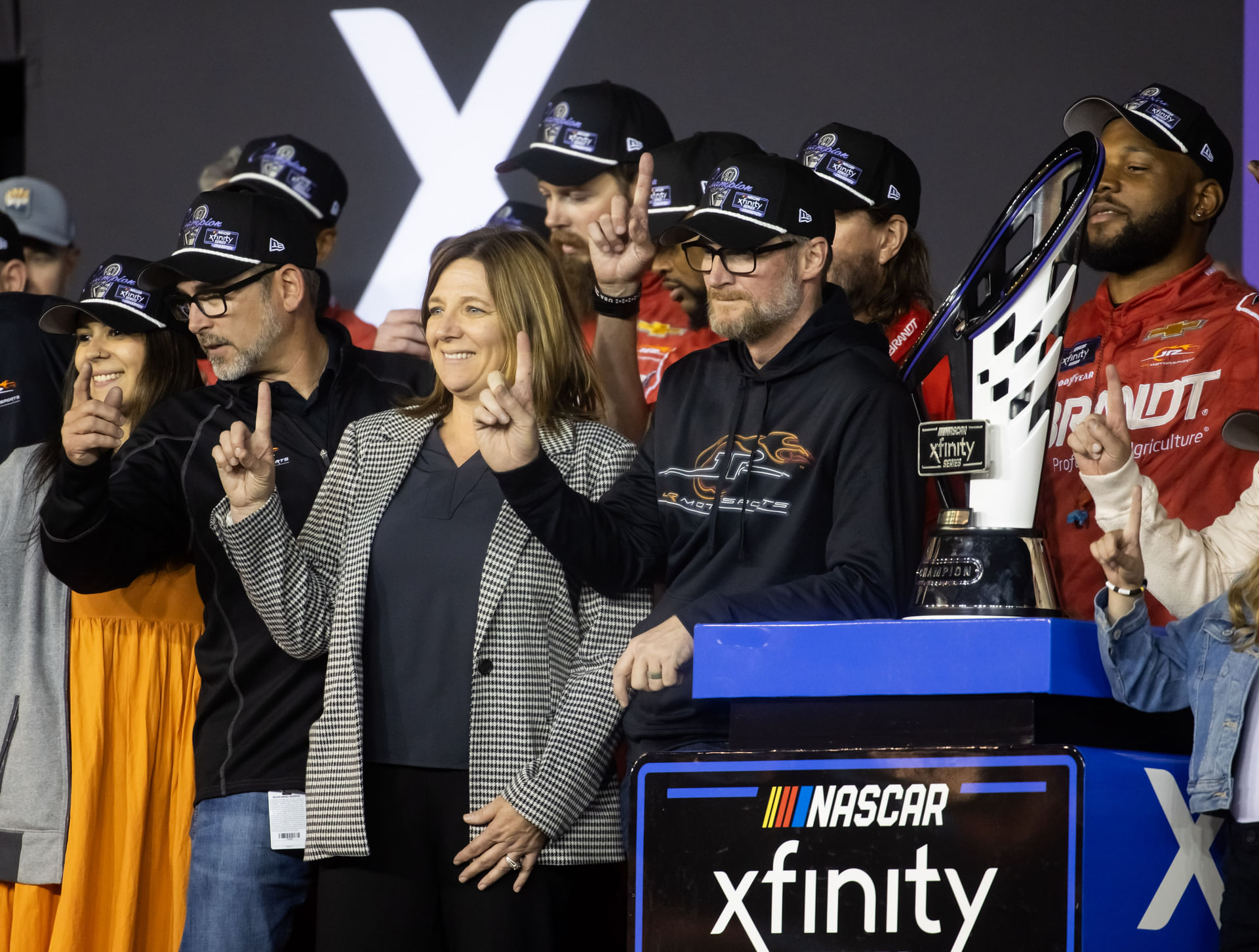 Dale Earnhardt Jr and sister Kelley Earnhardt Miller celebrate after winning the 2024 Xfinity Series championship during the Championship race at Phoenix Raceway - Source: Imagn