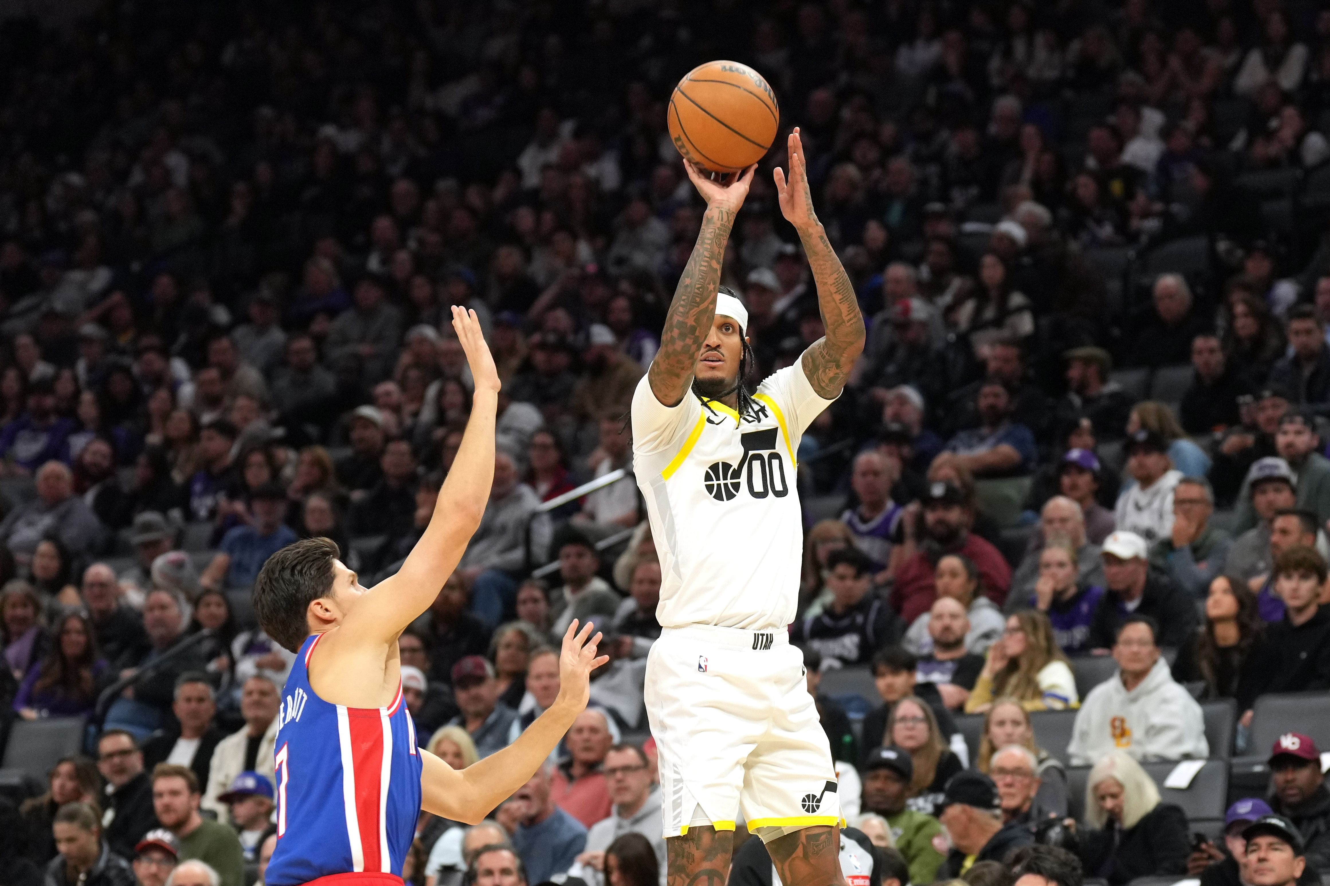 Utah Jazz guard Jordan Clarkson shoots against Sacramento Kings forward Doug McDermott at Golden 1 Center. Photo Credit: Imagn