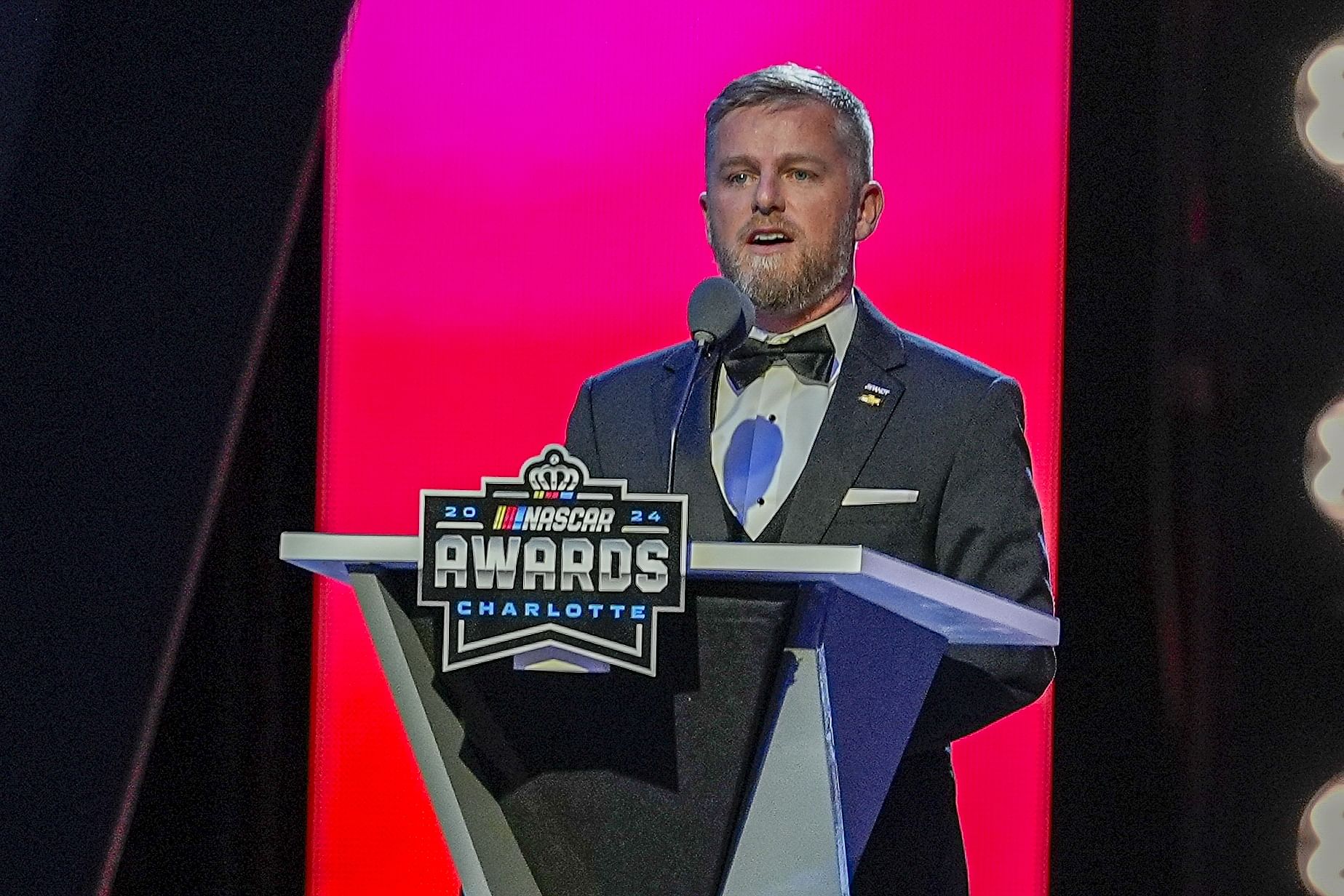 Justin Allgaier talks to the audience during the NASCAR Awards Banquet at Charlotte Convention Center. - Source: Imagn