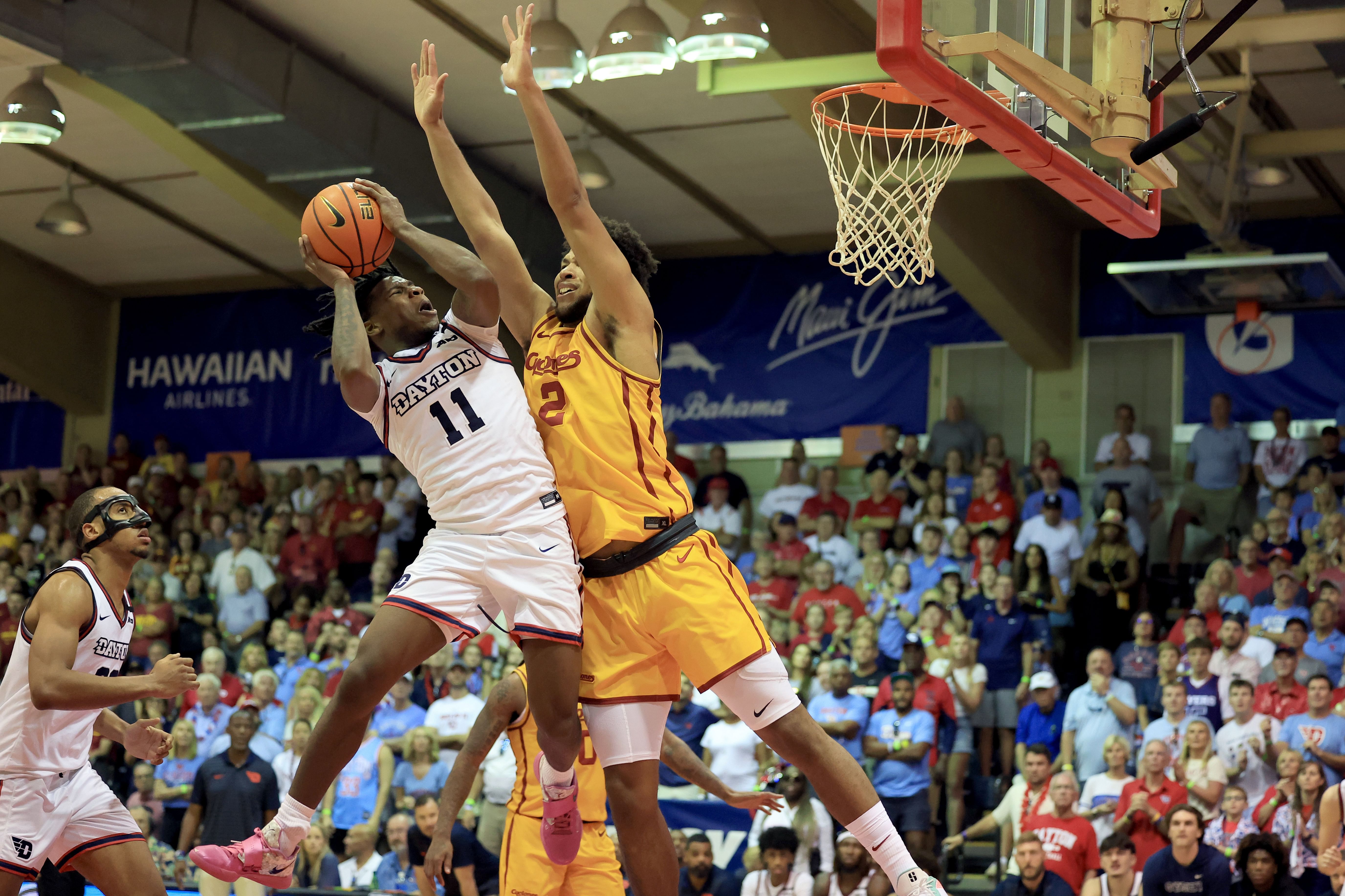 Dayton Flyers guard Malachi Smith (11) attacks the defense of Iowa State Cyclones forward Joshua Jefferson (2) in the second half at Lahaina Civic Center. Photo: Imagn