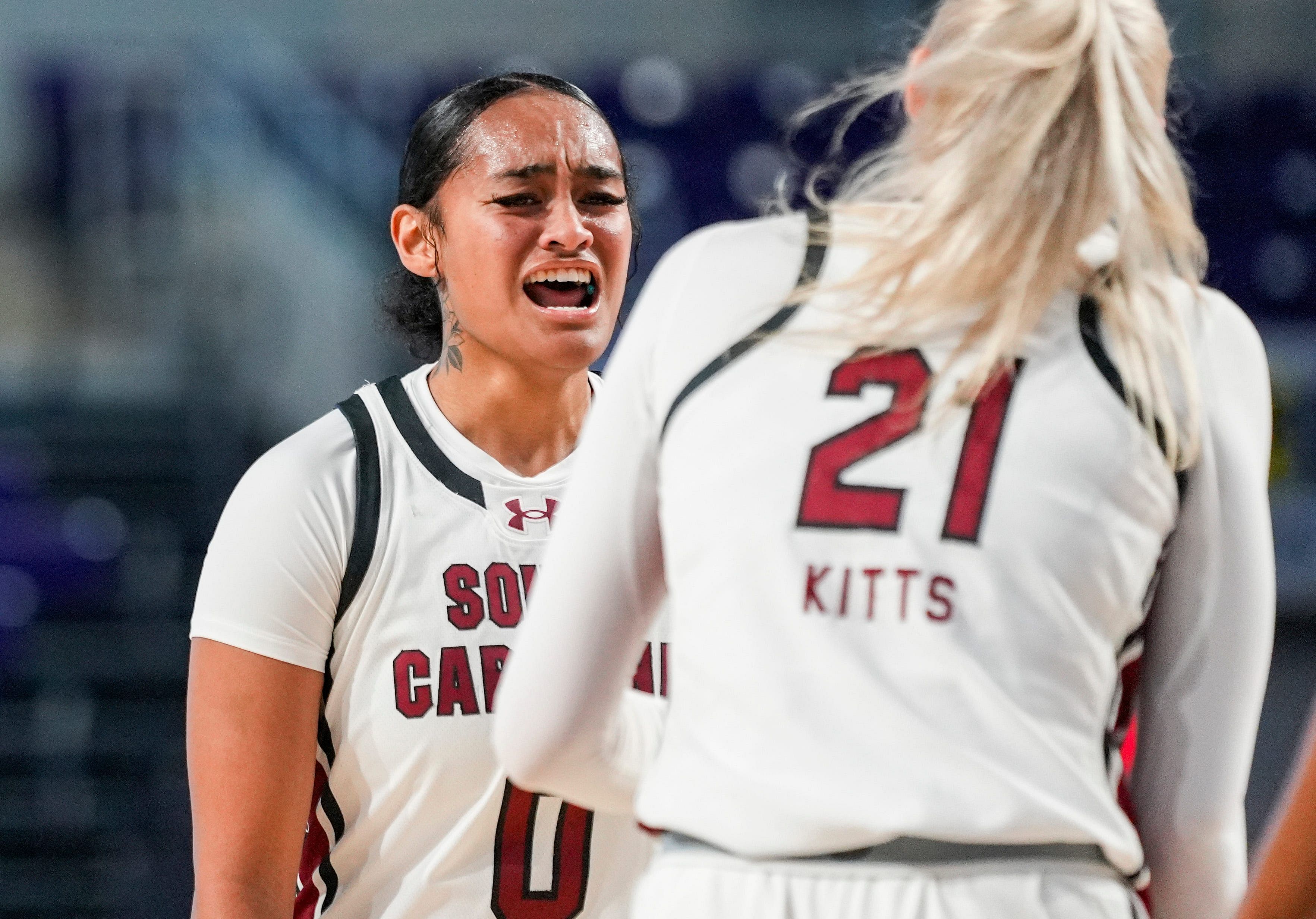 South Carolina Gamecocks guard Te-Hina Paopao (#0) and forward Chloe Kitts (#21) celebrate after drawing a foul during the first quarter of their game against the Iowa State Cyclones at Suncoast Credit Union Arena in Fort Myers. Photo: Imagn